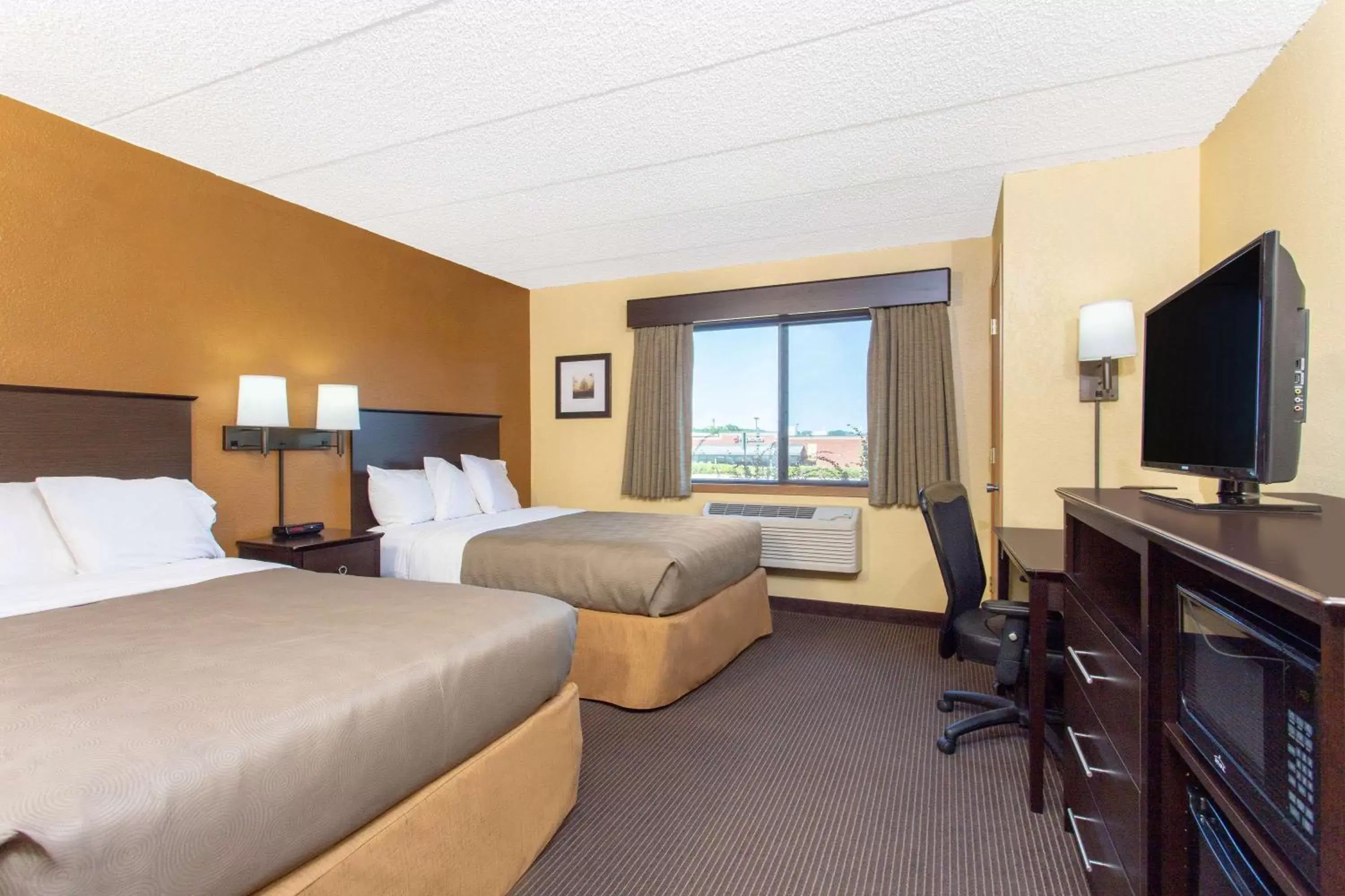 Photo of the whole room in AmericInn by Wyndham West Bend