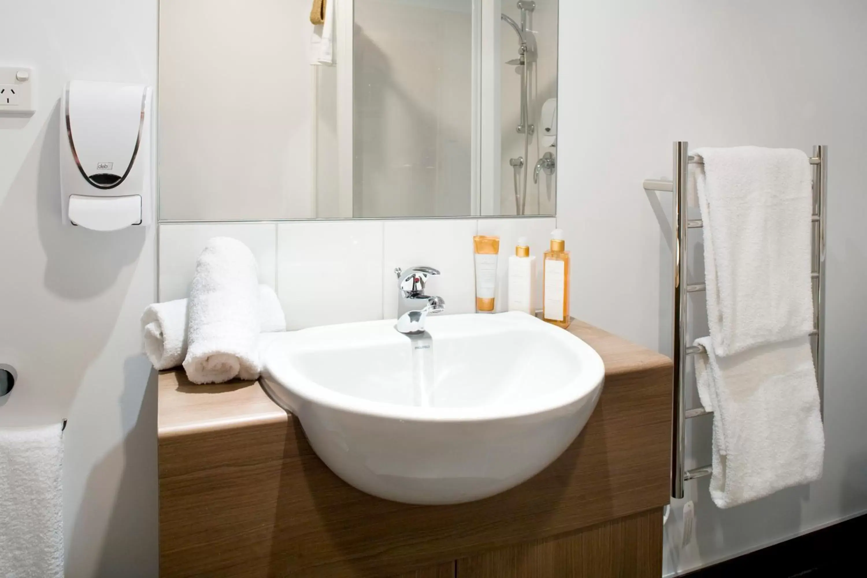 Bathroom in Nesuto St Martins Apartment Hotel