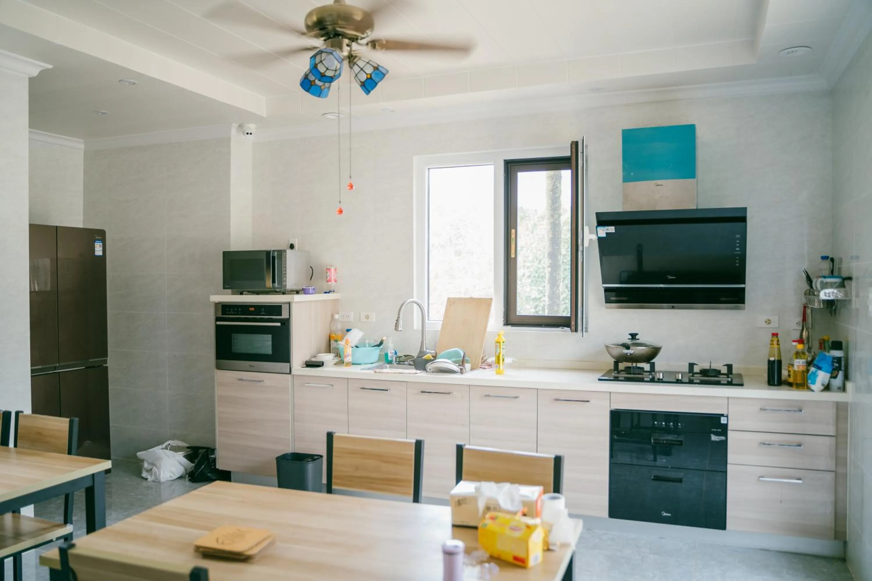 Communal kitchen in Saipan Emerald Villa
