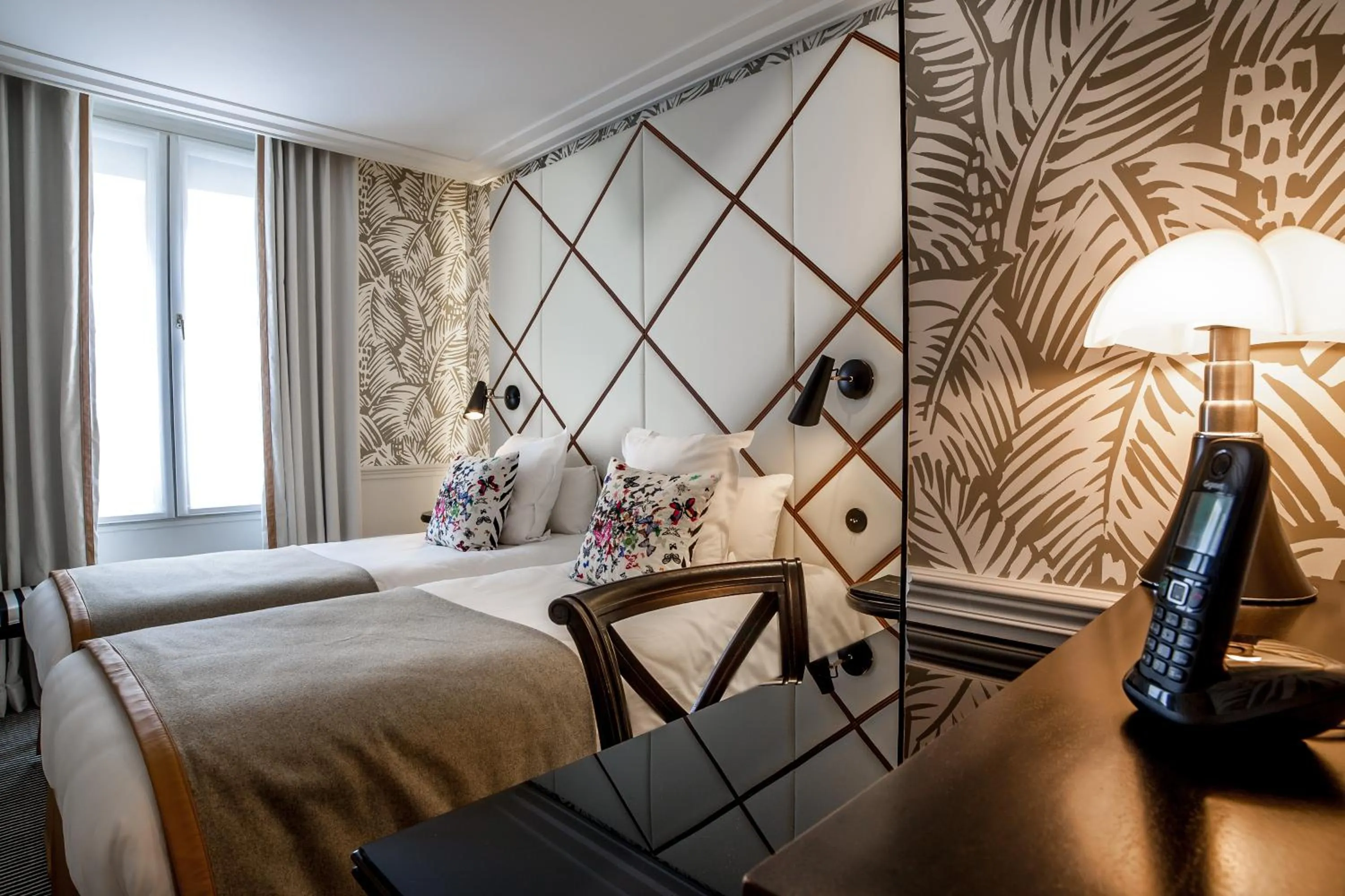 Bed in Hôtel Jardin Le Bréa