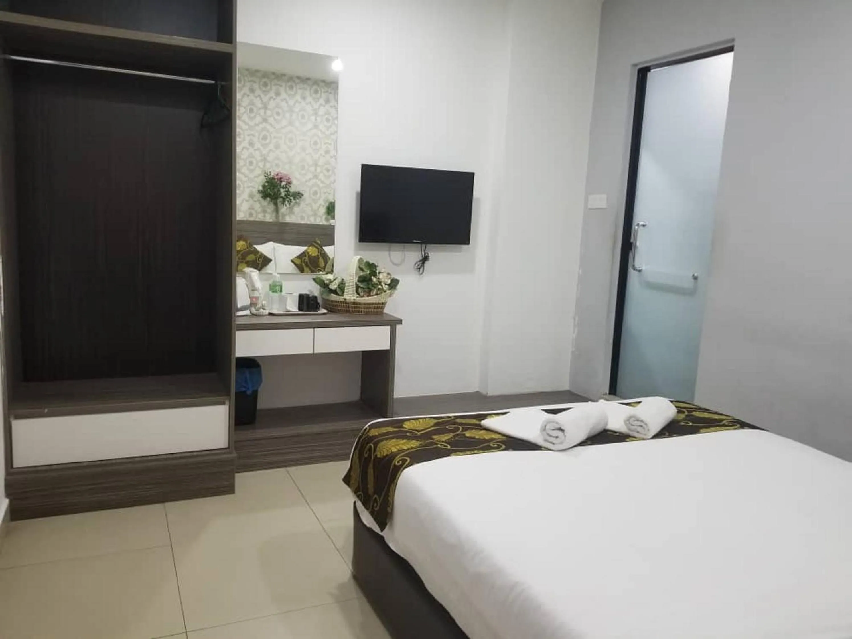 Photo of the whole room, Bed in D'Metro Hotel