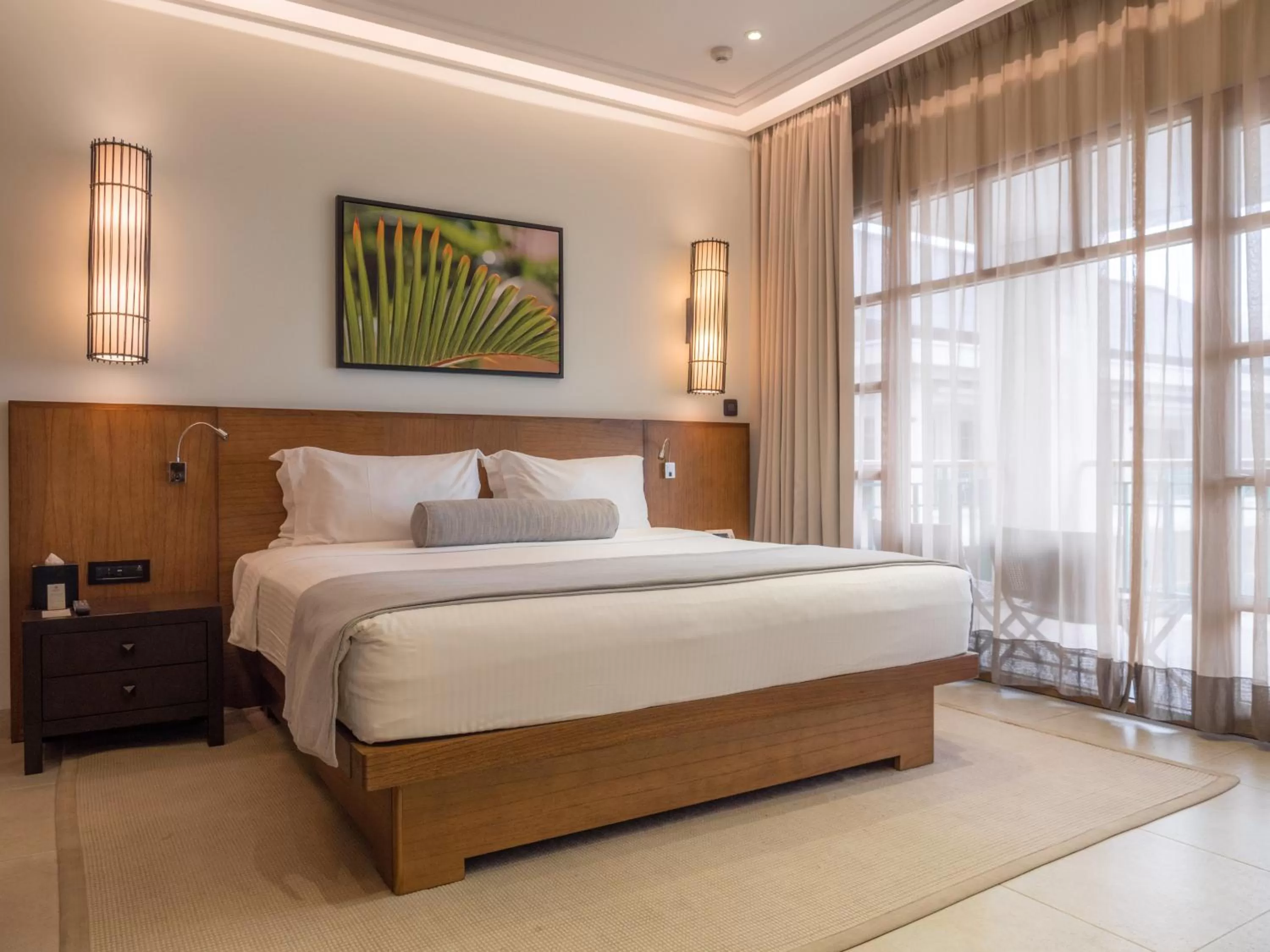 Bed in Savoy Seychelles Resort & Spa