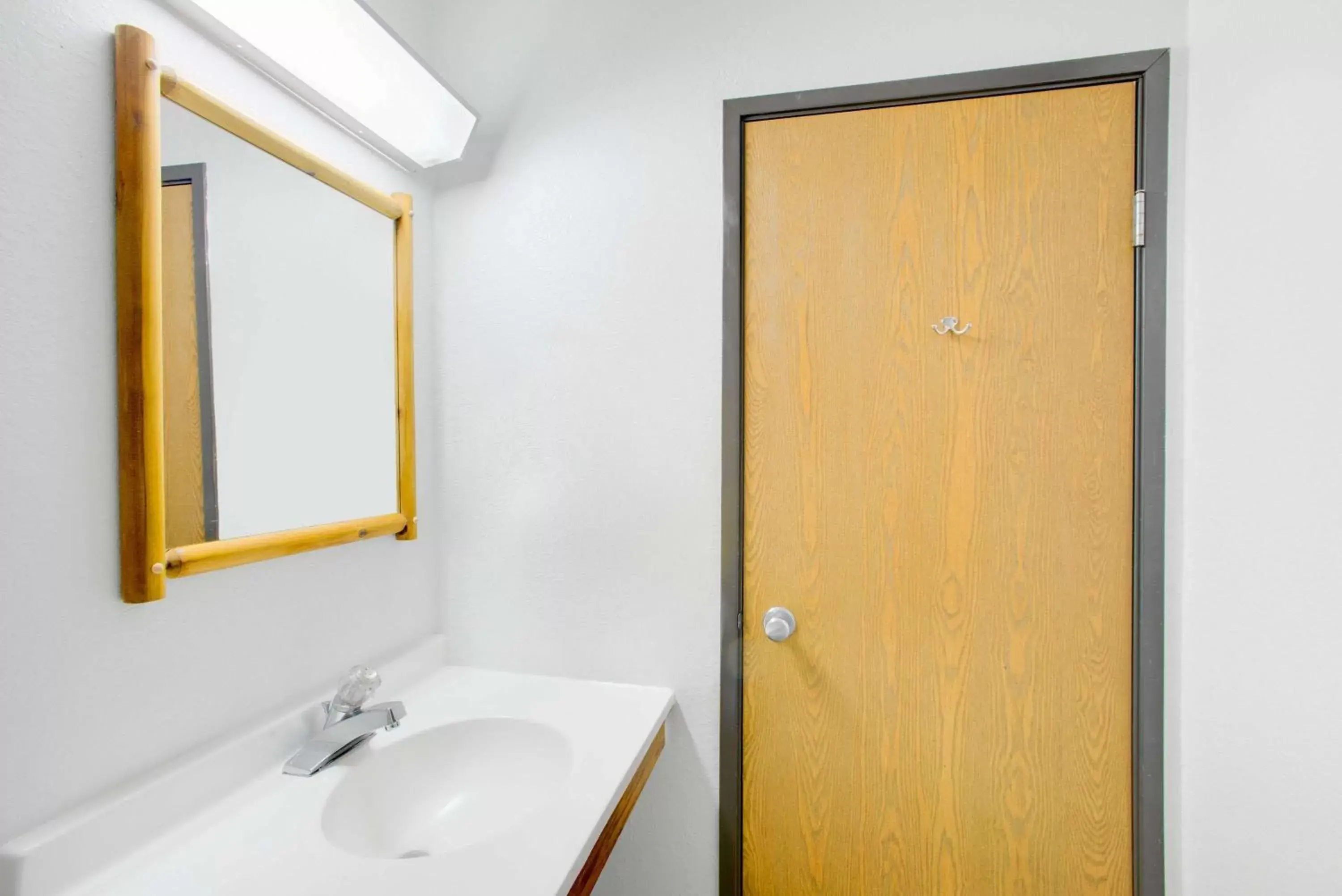 Bathroom in Super 8 by Wyndham Lake George/Warrensburg Area