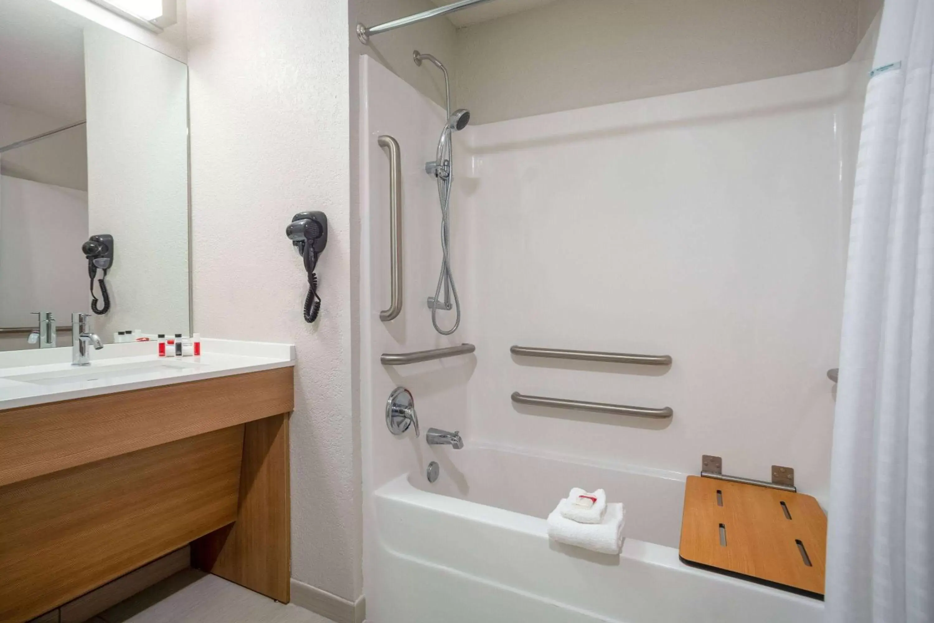 Bathroom in Microtel Inn & Suites by Wyndham Liberty NE Kansas City Area