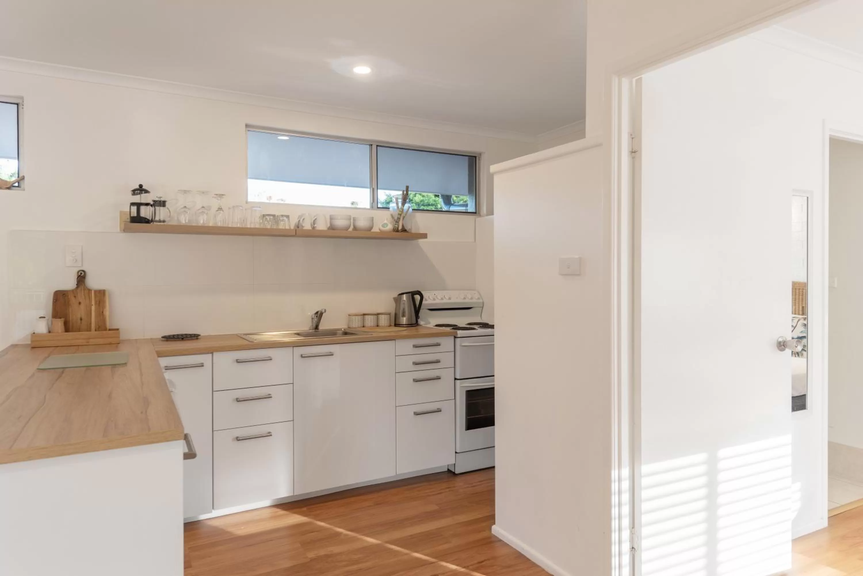 Kitchen or kitchenette in Lychee Tree Holiday Apartments