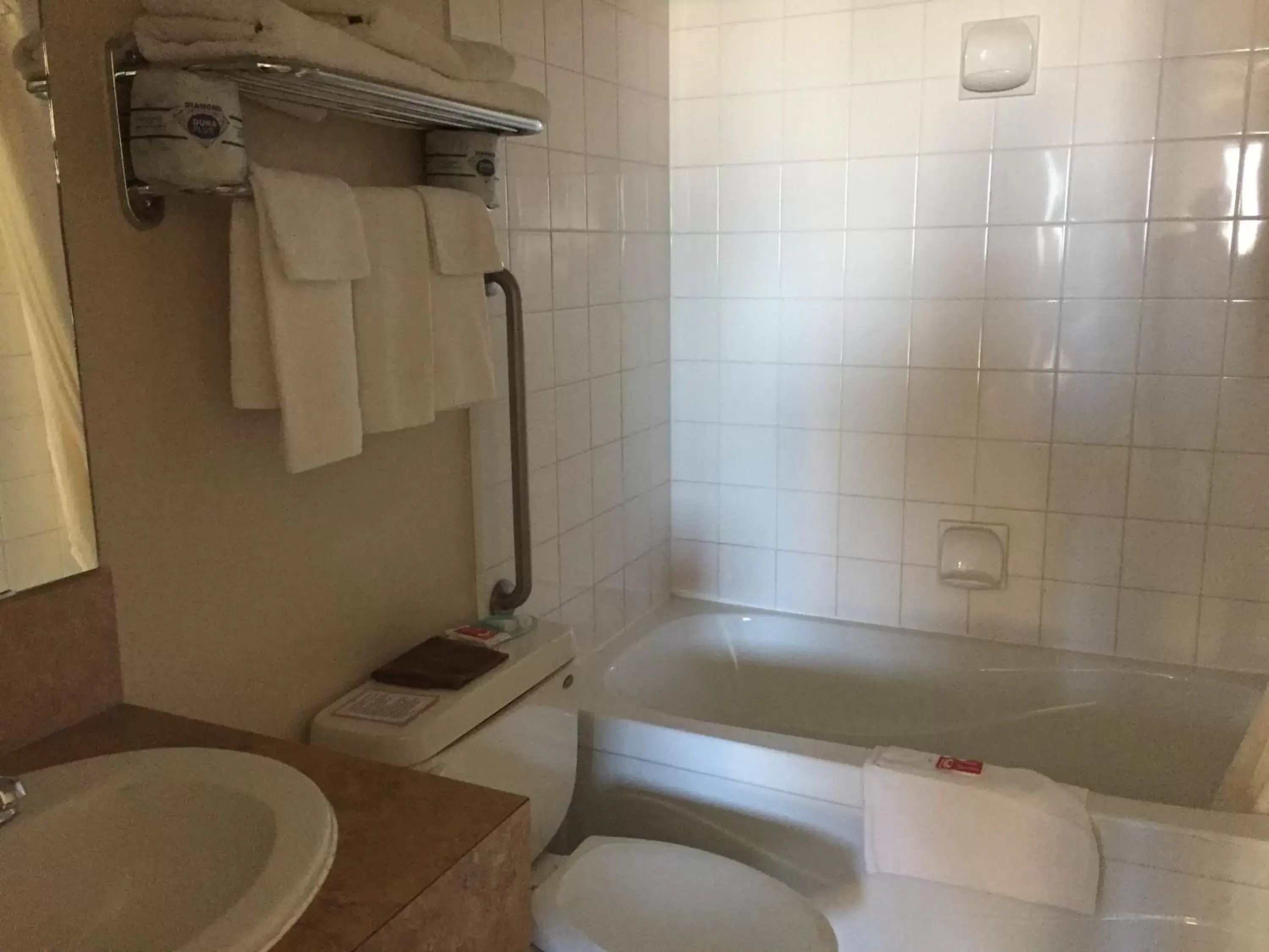 Bathroom in Travel Inn & Suites