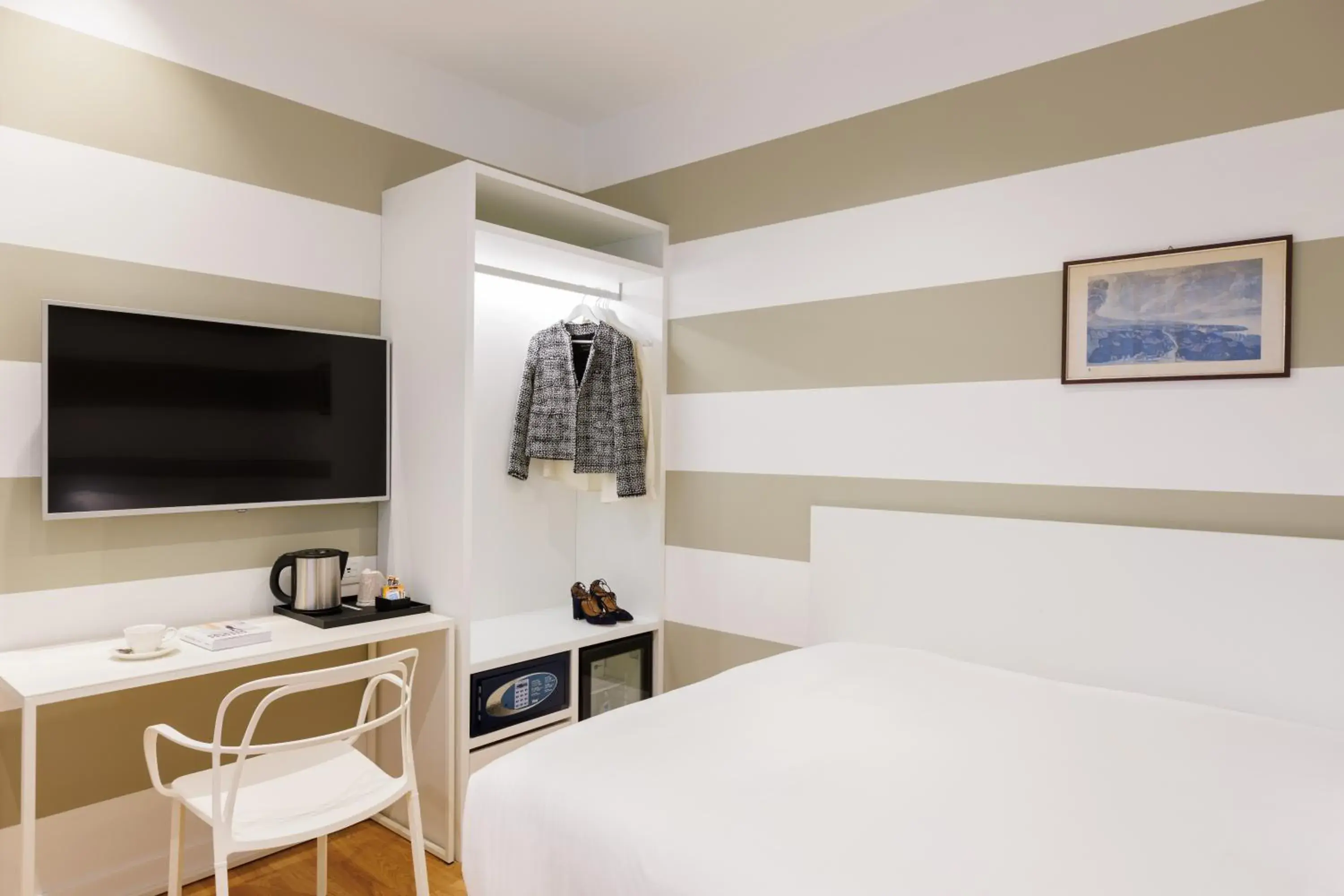 Bed, TV/Entertainment Center in Hotel Morfeo