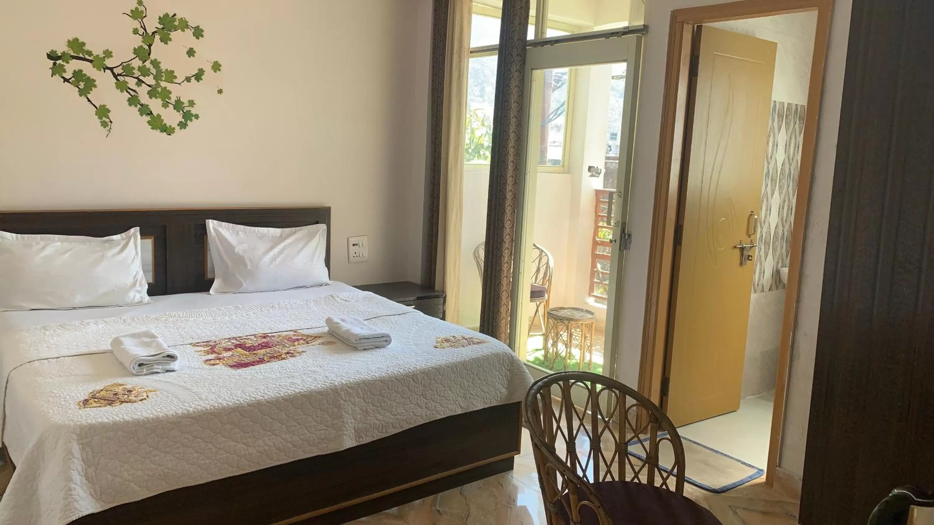 Bed in Rudram Hotel Yoga & Ayurveda Retreat