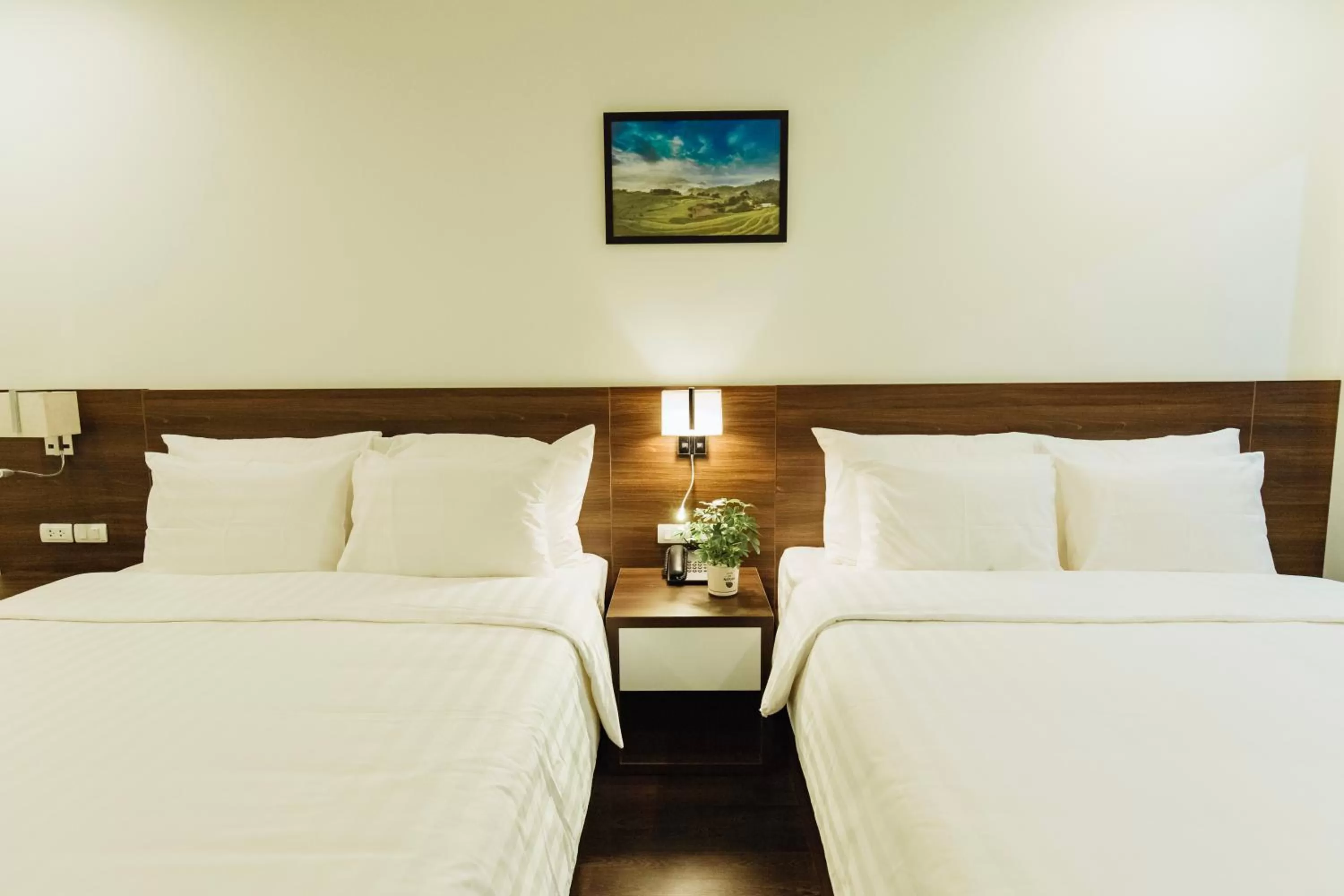 Bed in Paragon Noi bai Hotel & Pool