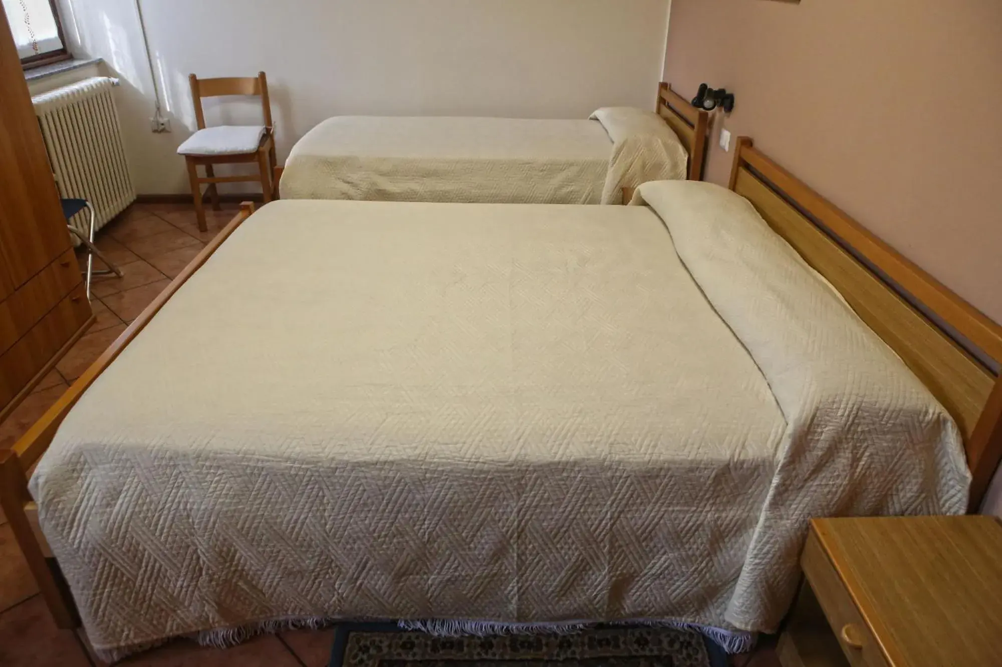 Photo of the whole room, Bed in Albergo Gusmeroli