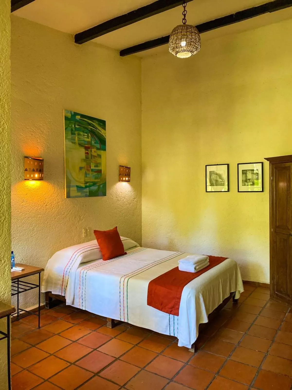 Bed in Hotel Maya Bell