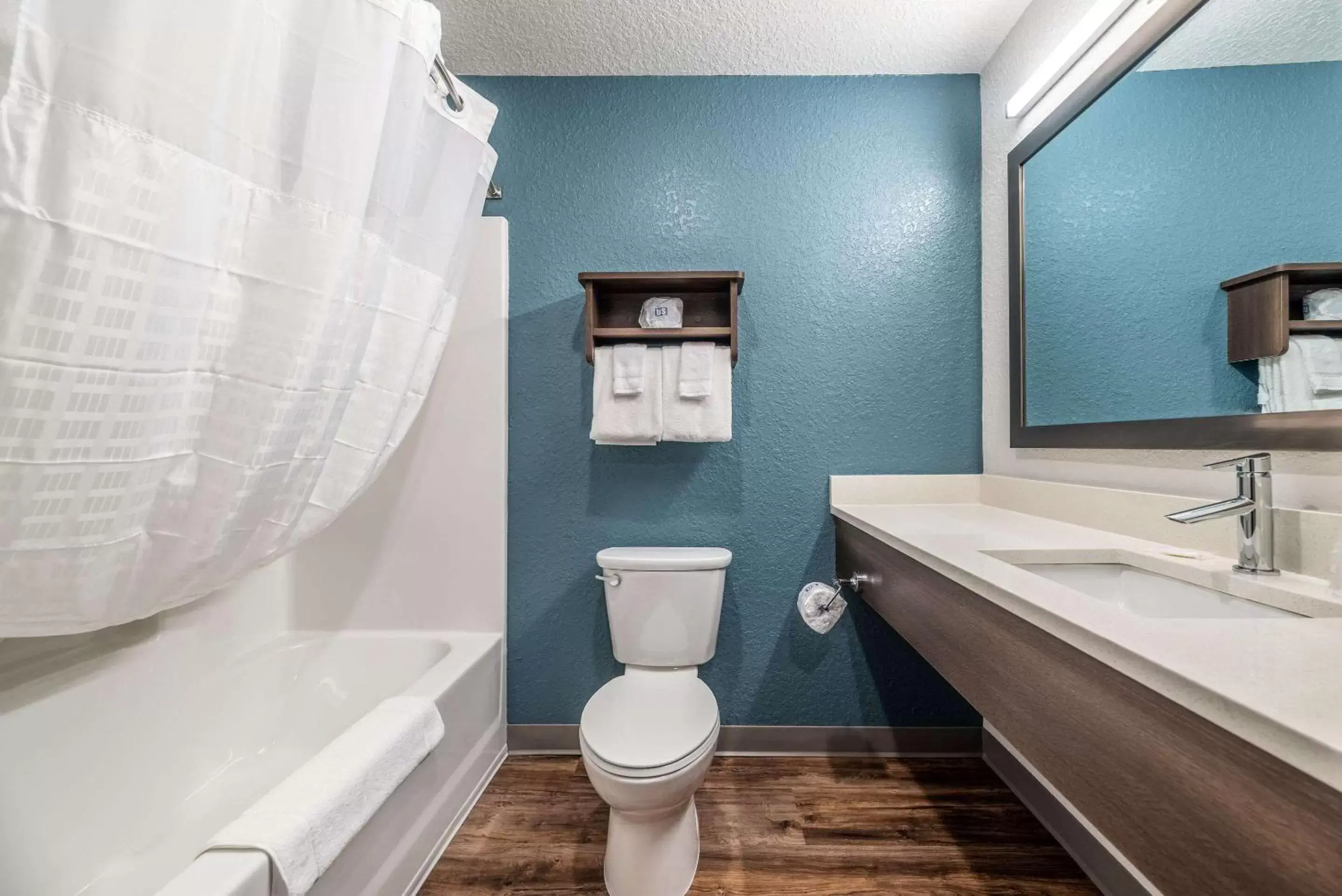 Bathroom in WoodSpring Suites Sanford North I-4 Orlando Area