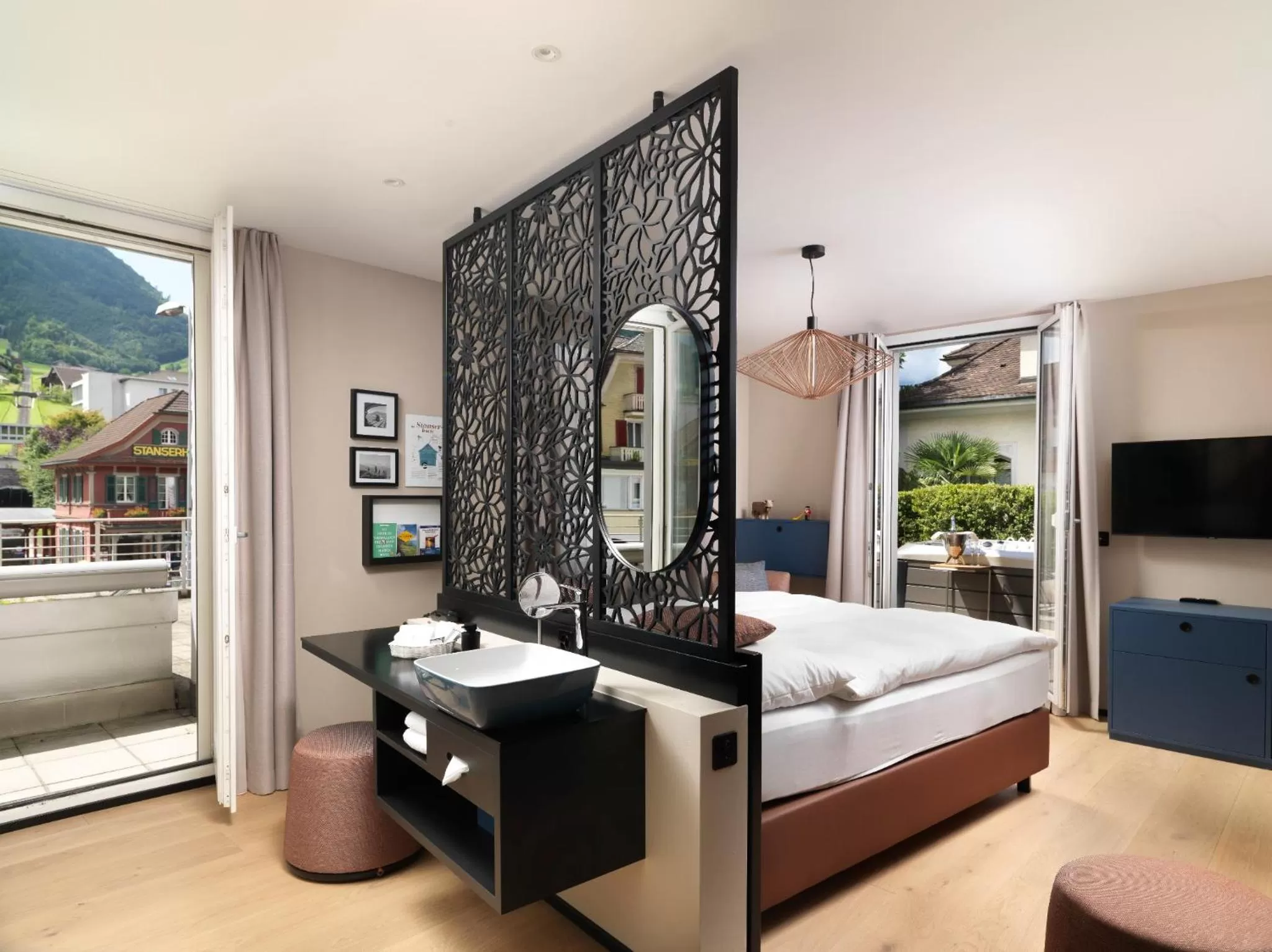 Photo of the whole room, Bed in Boutique Hotel Stanserhof