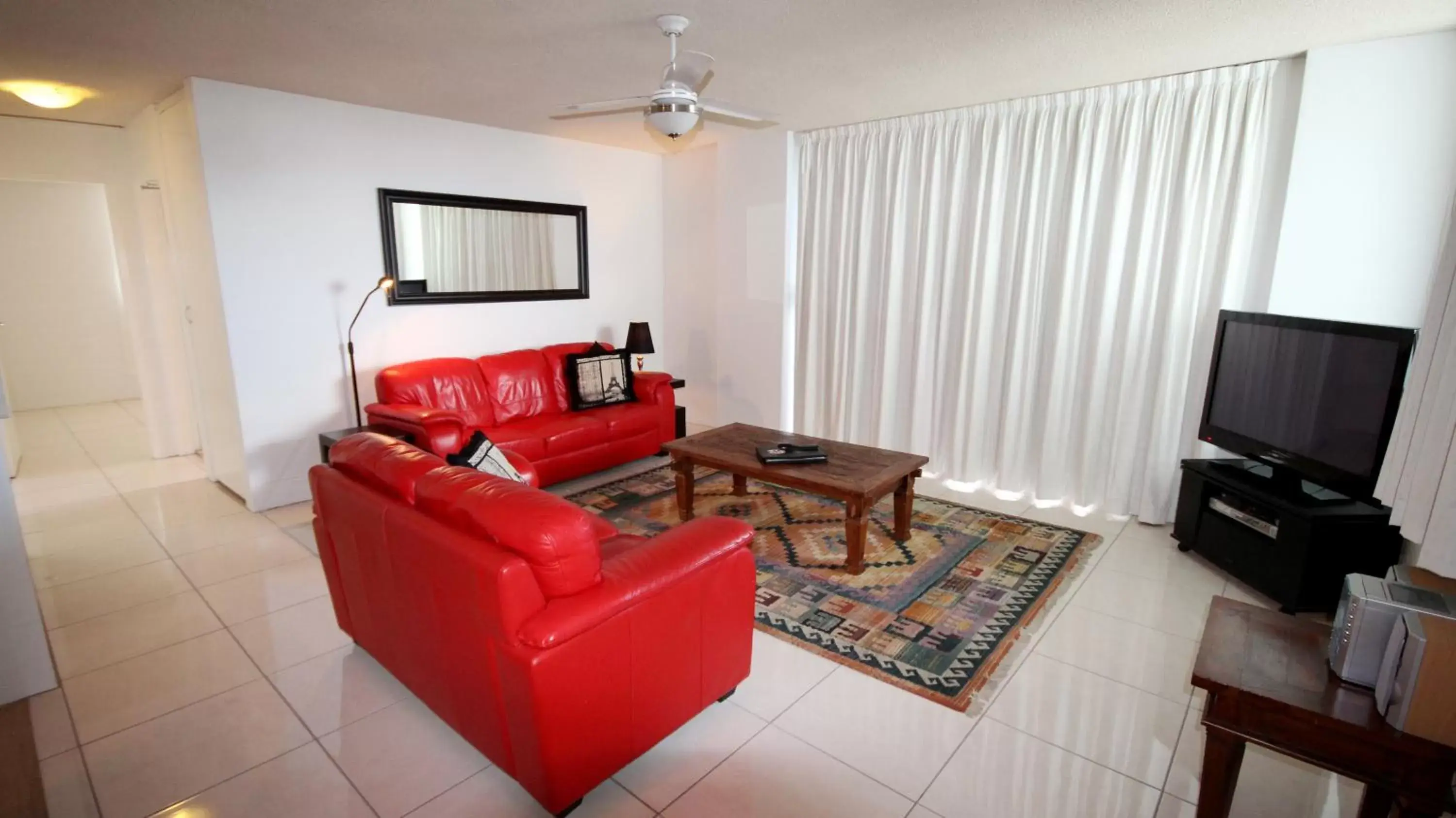 Living room, Seating Area in Tradewinds Apartments