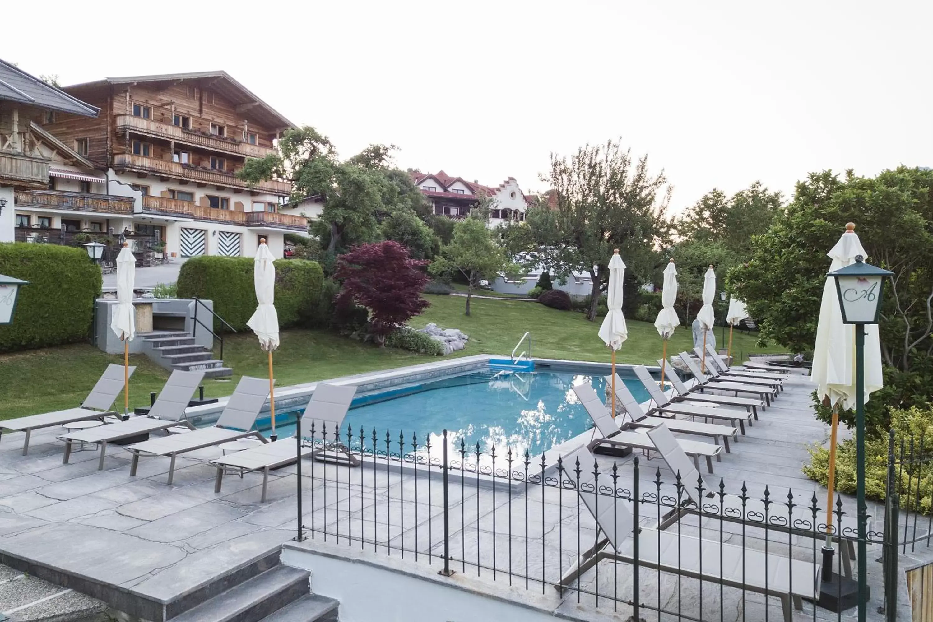 Property building, Swimming Pool in Hotel AlpenSchlössl