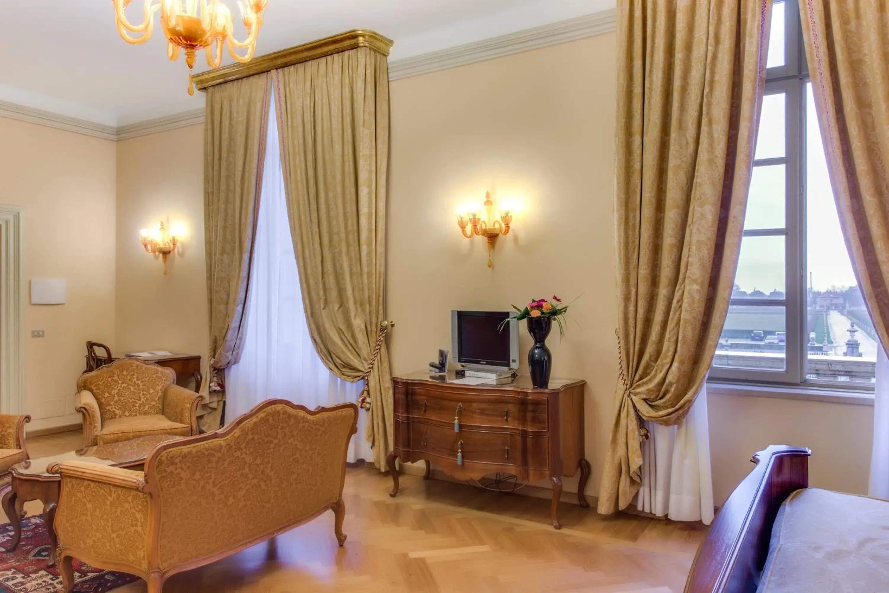 Photo of the whole room, TV/Entertainment Center in Villa Fenaroli Palace Hotel