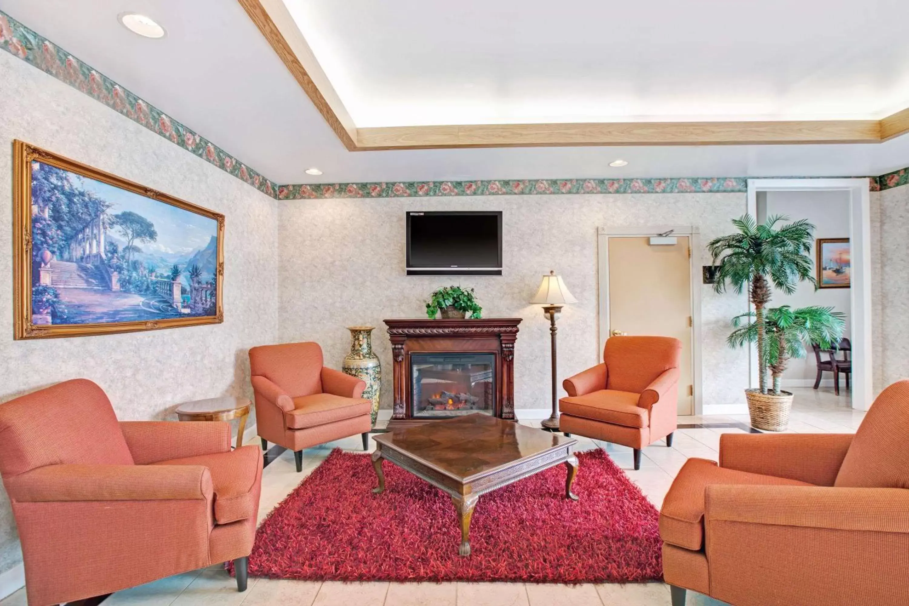 Lobby or reception in Ramada by Wyndham Flemington Lobby or reception in Ramada by Wyndham Flemington
