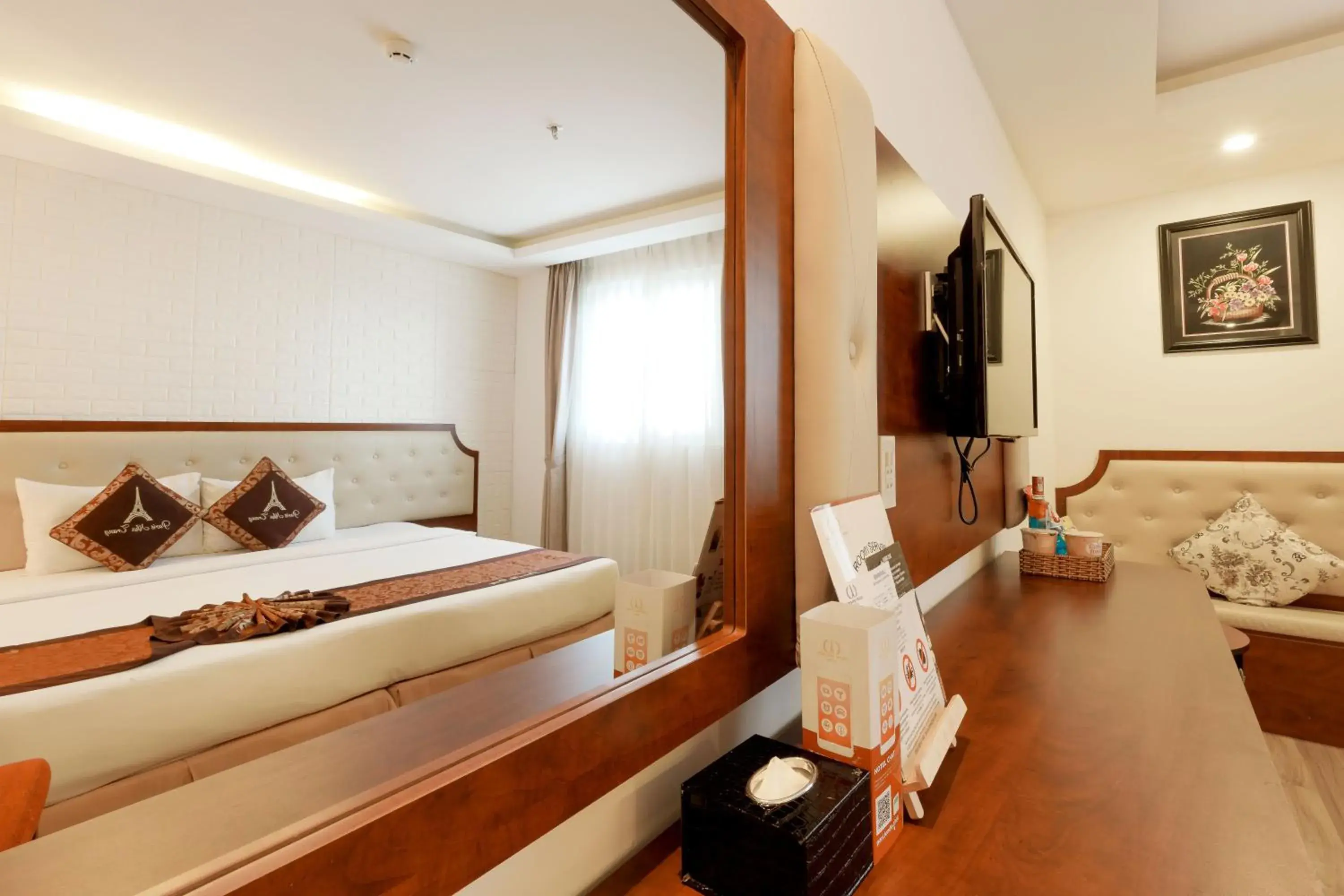 Communal lounge/ TV room, Bed in Paris Nha Trang Hotel