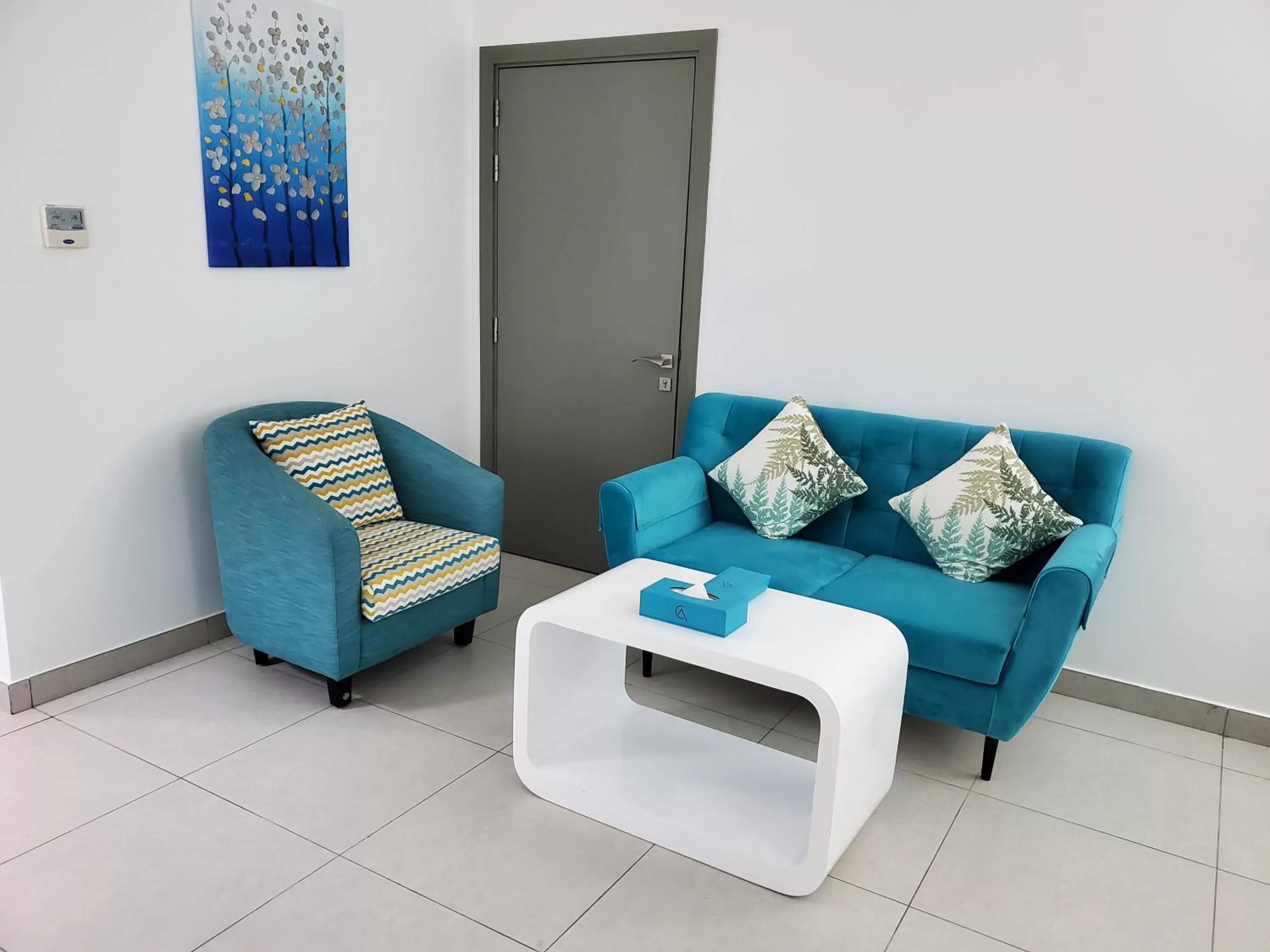 Seating area in City Avenue Al Reqqa Hotel