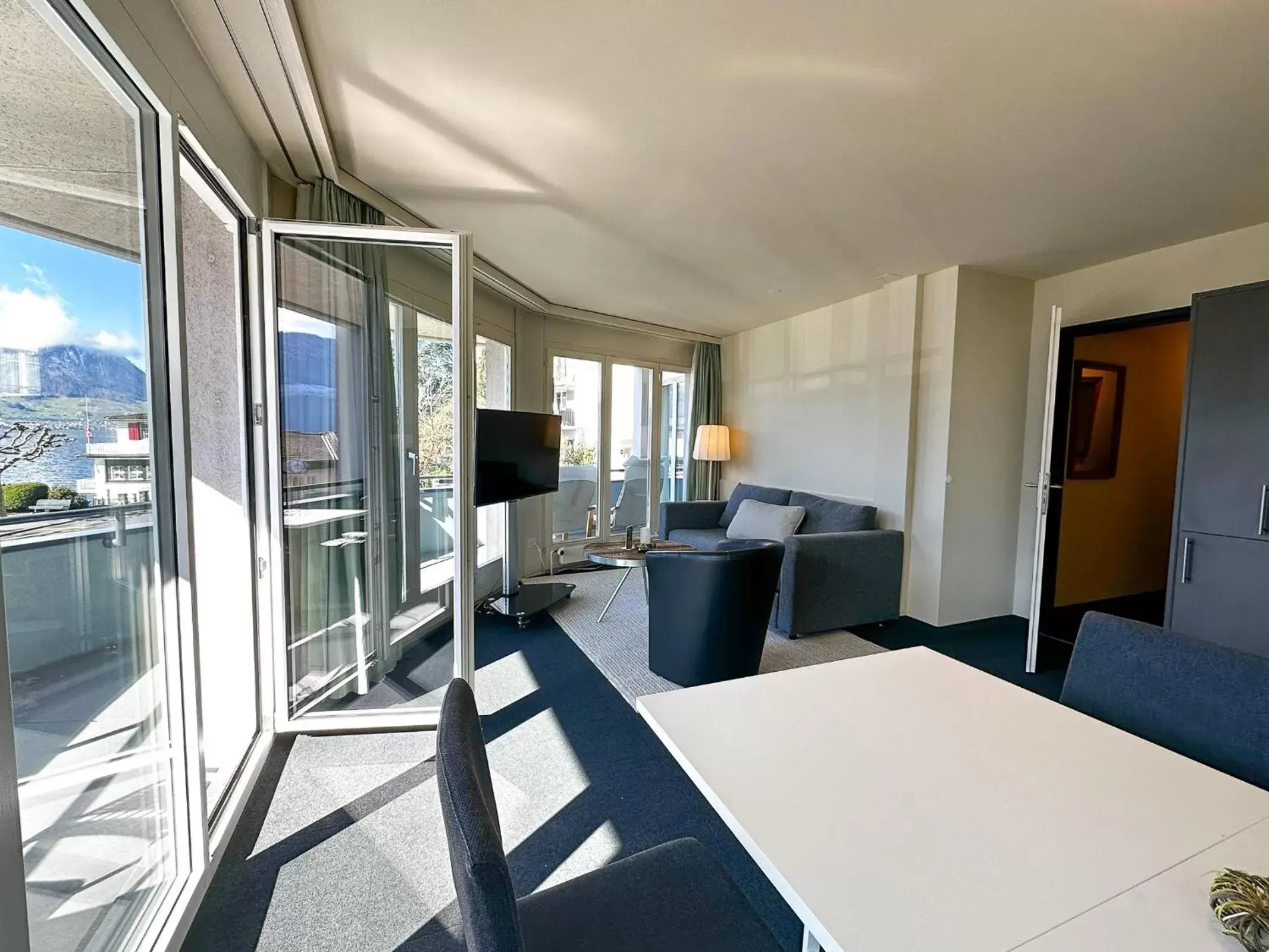 Communal lounge/ TV room in Seehotel Riviera at Lake Lucerne