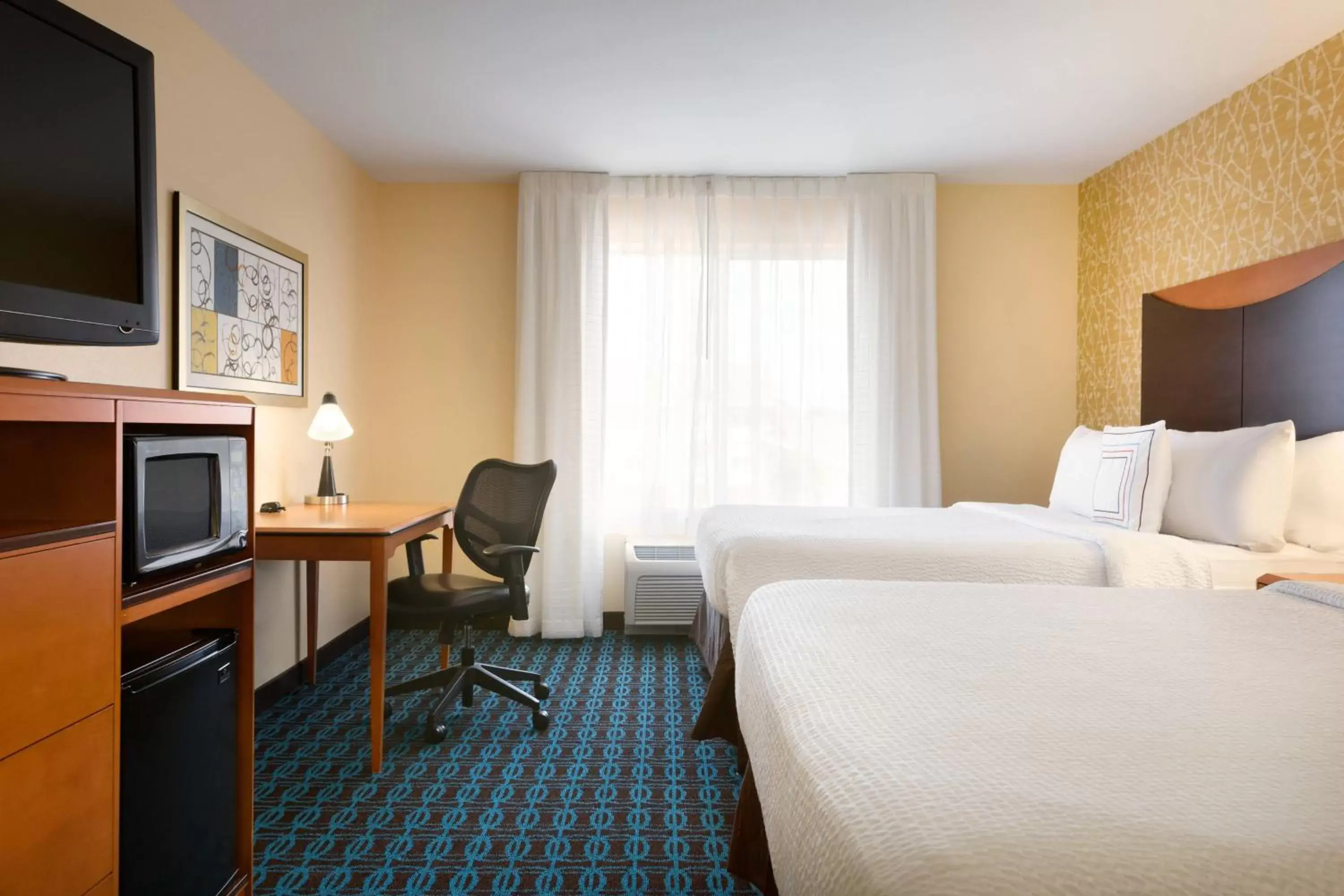 Photo of the whole room, Bed in Fairfield Inn & Suites by Marriott Weirton