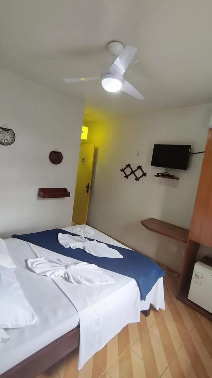 Bed in Pousada Do Suiá