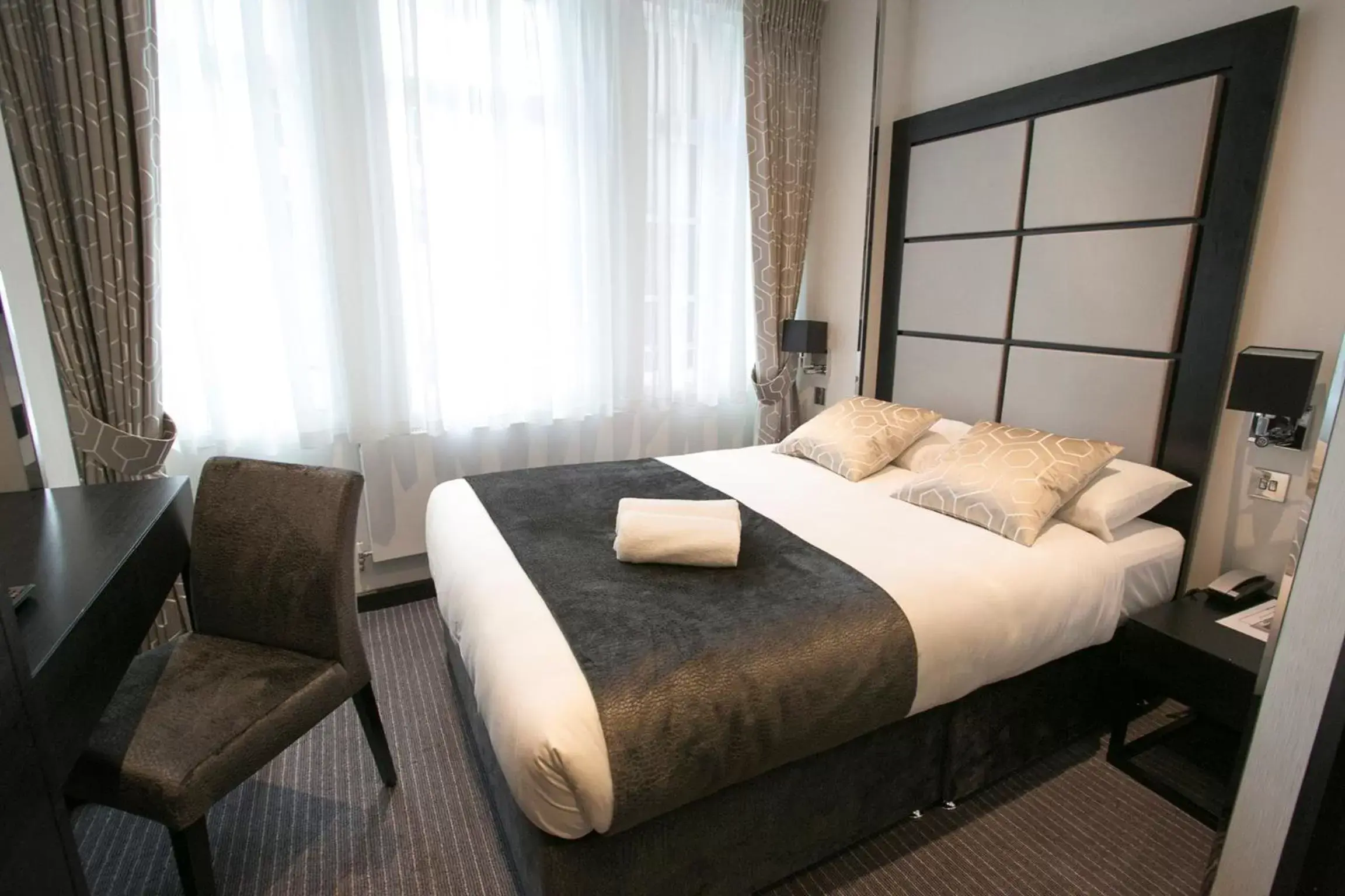 Bed in Great St Helen Hotel