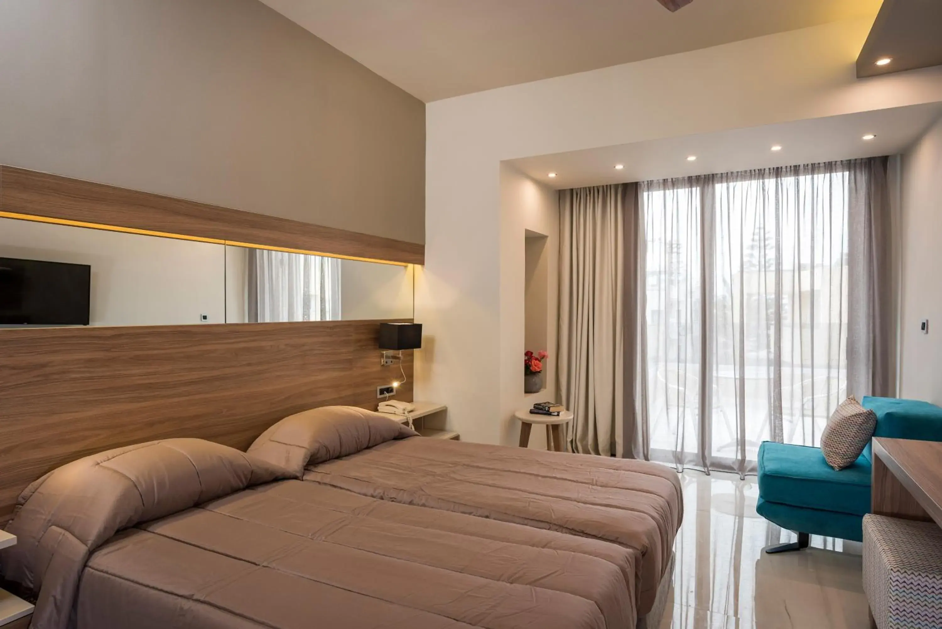 Bed in Atrion Resort Hotel