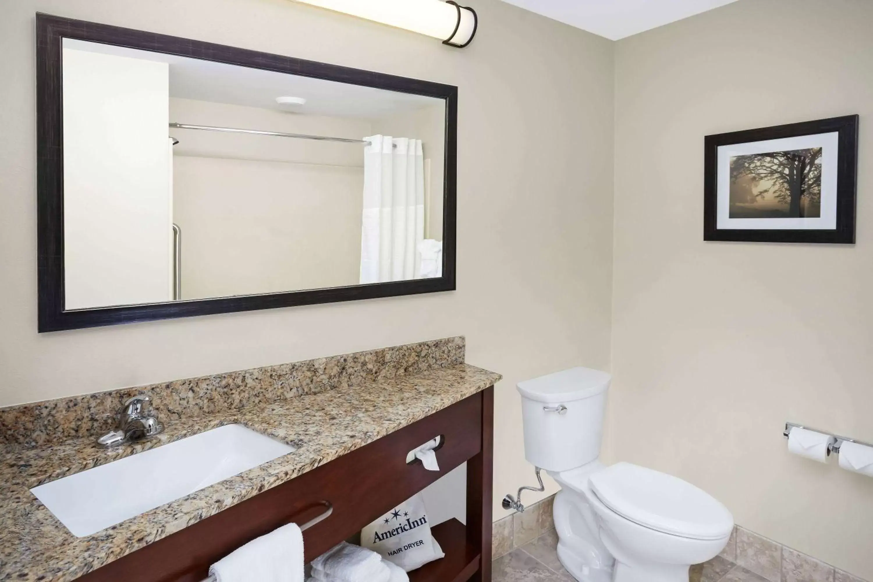 Bathroom in AmericInn by Wyndham Waupun