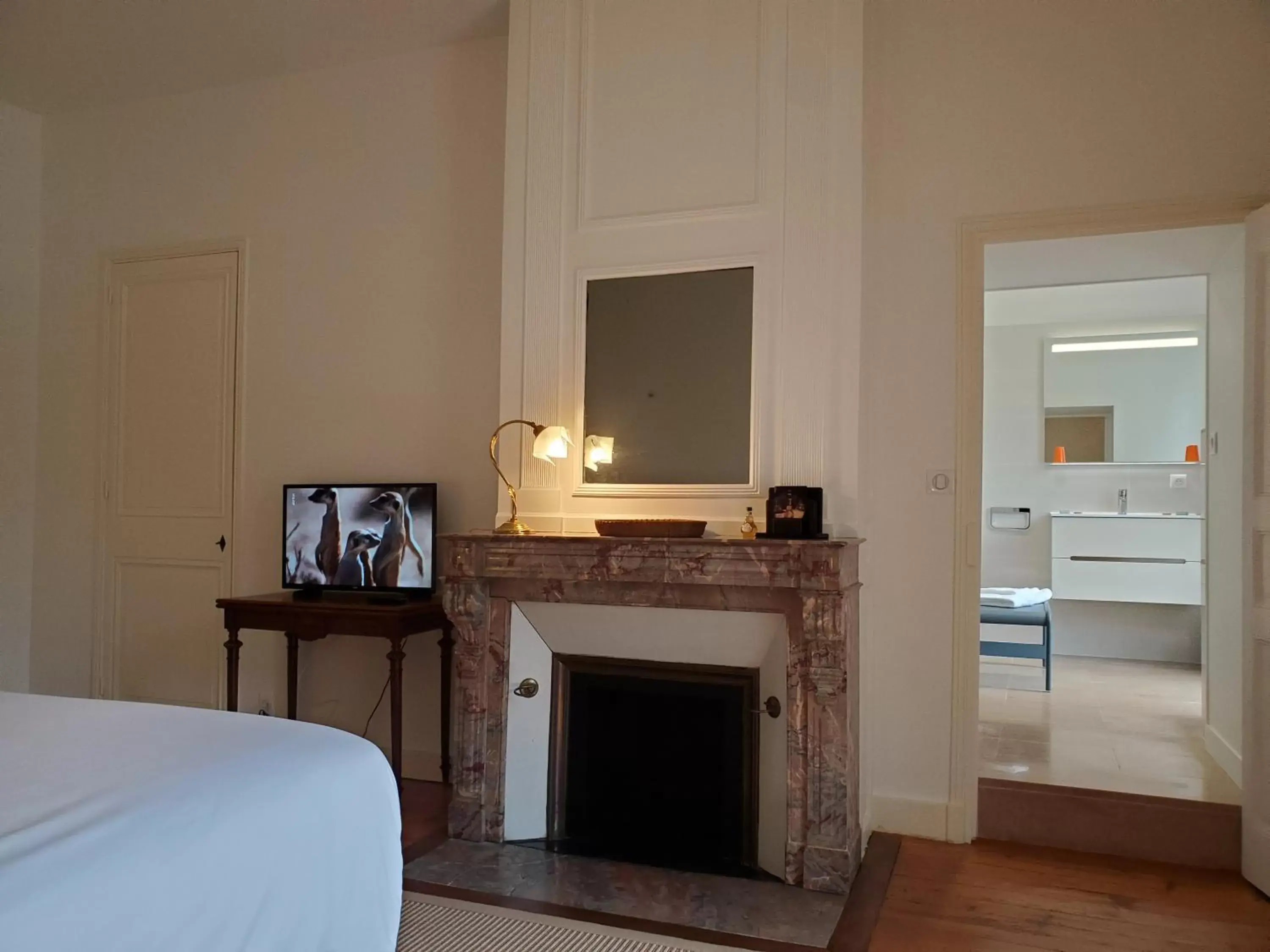 Bedroom, TV/Entertainment Center in Logis des Tourelles