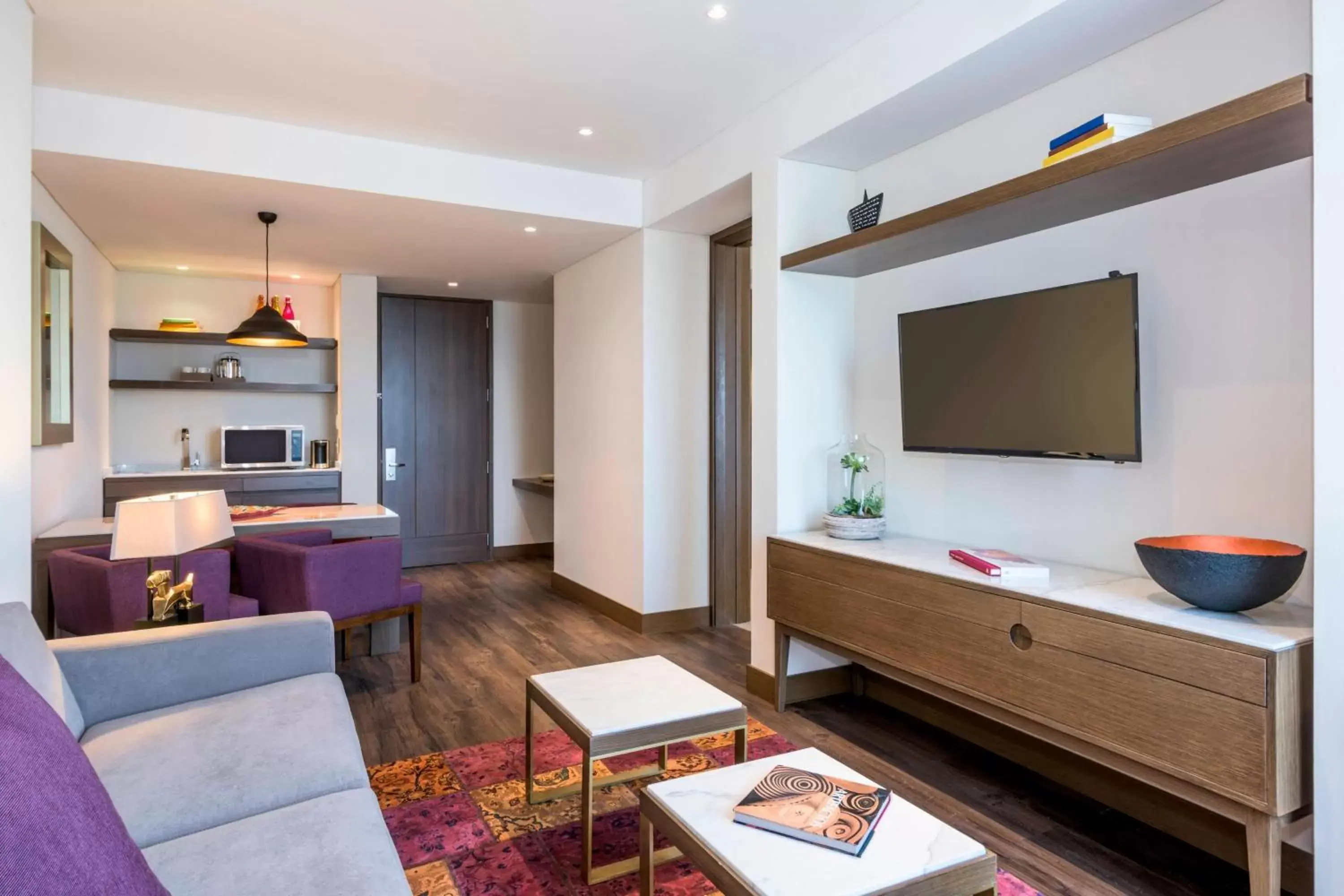 Living room, TV/Entertainment Center in Courtyard by Marriott Bogota Airport