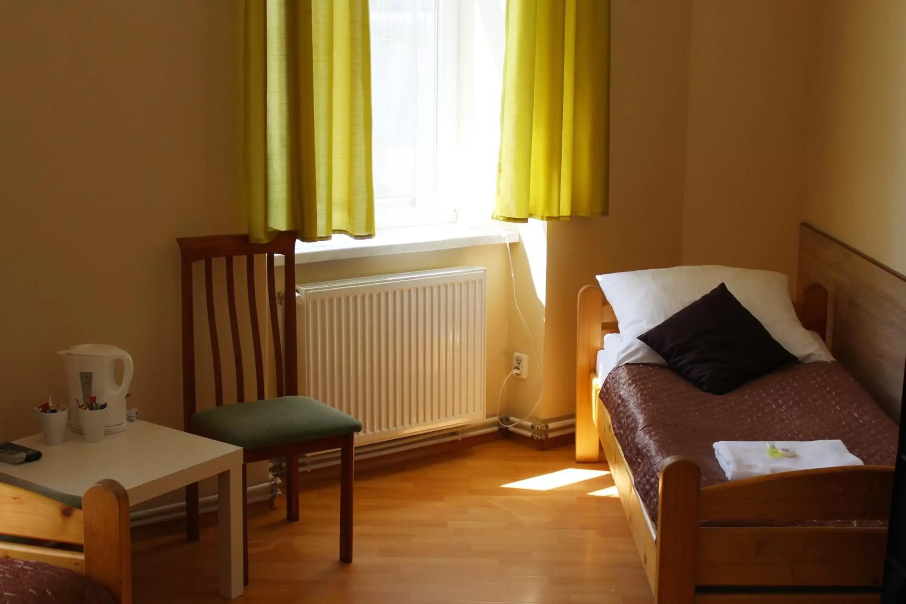 Bed, Seating Area in Station Aparthotel