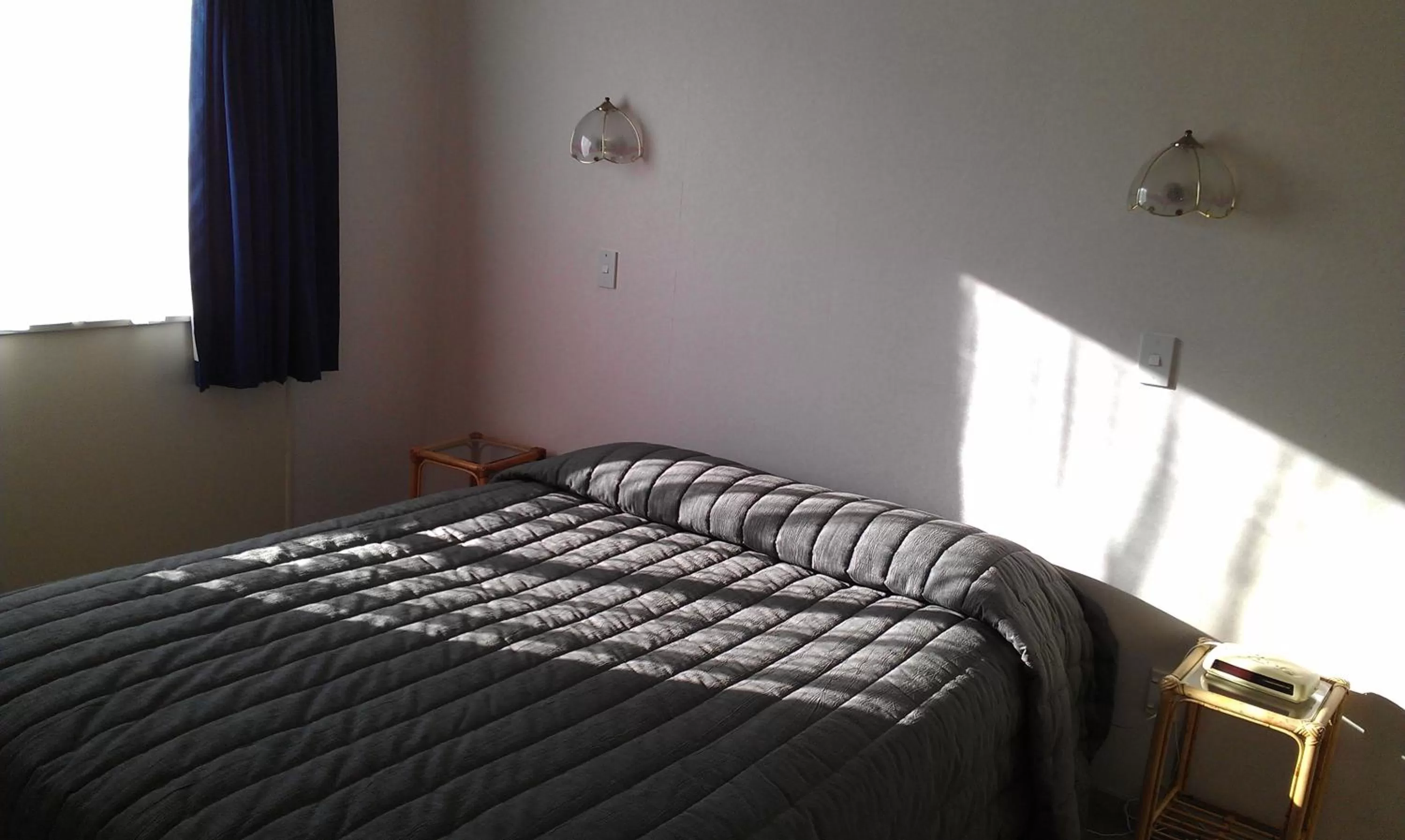 Bed in Riverview Motel