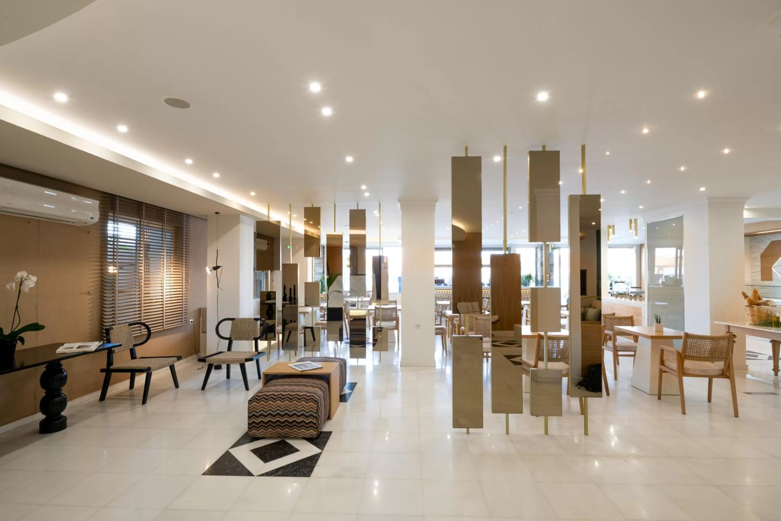 Communal lounge/ TV room in Elounda Akti Olous (Adults Only)