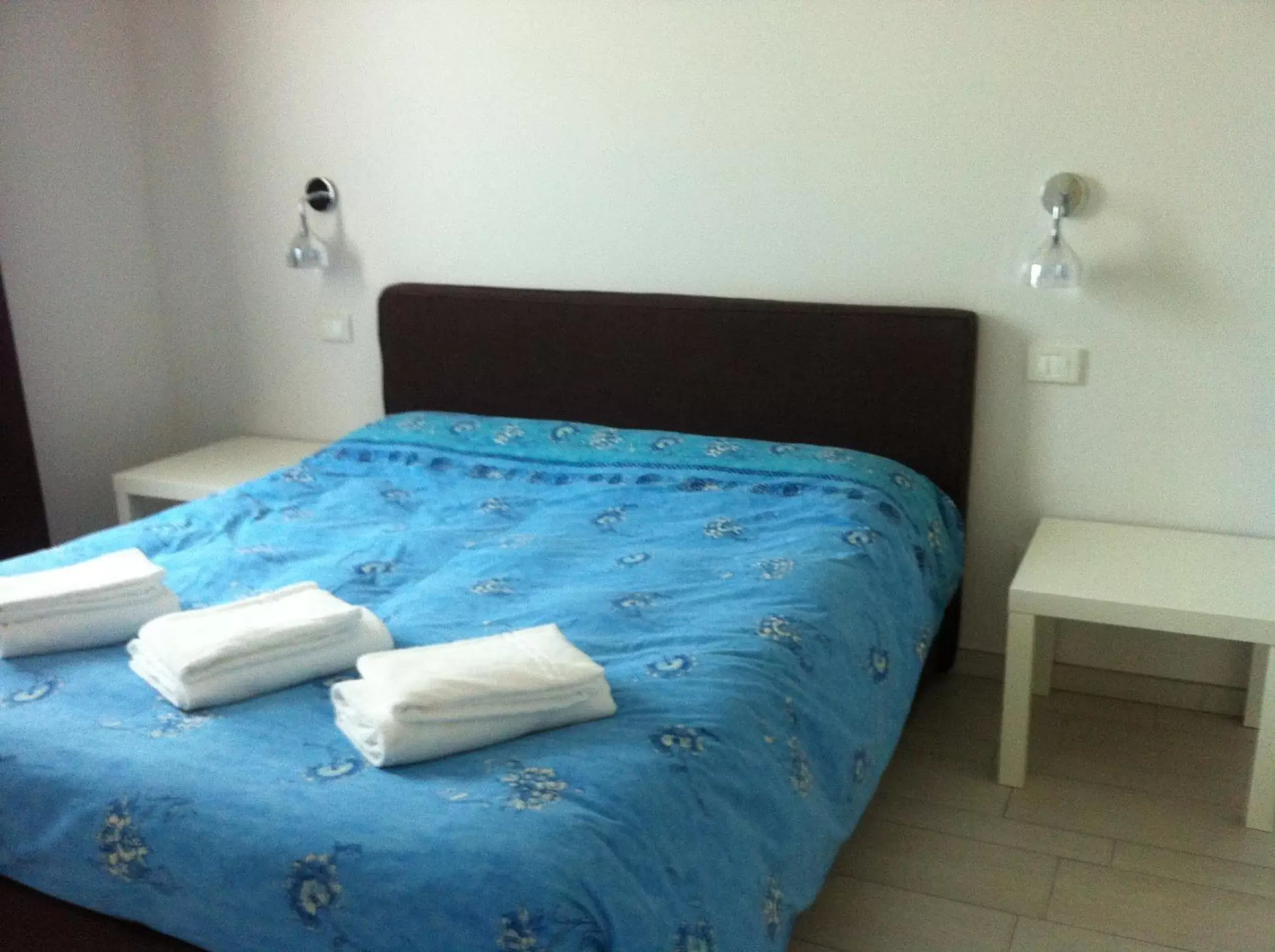 Bed in La Fattoria Apartments
