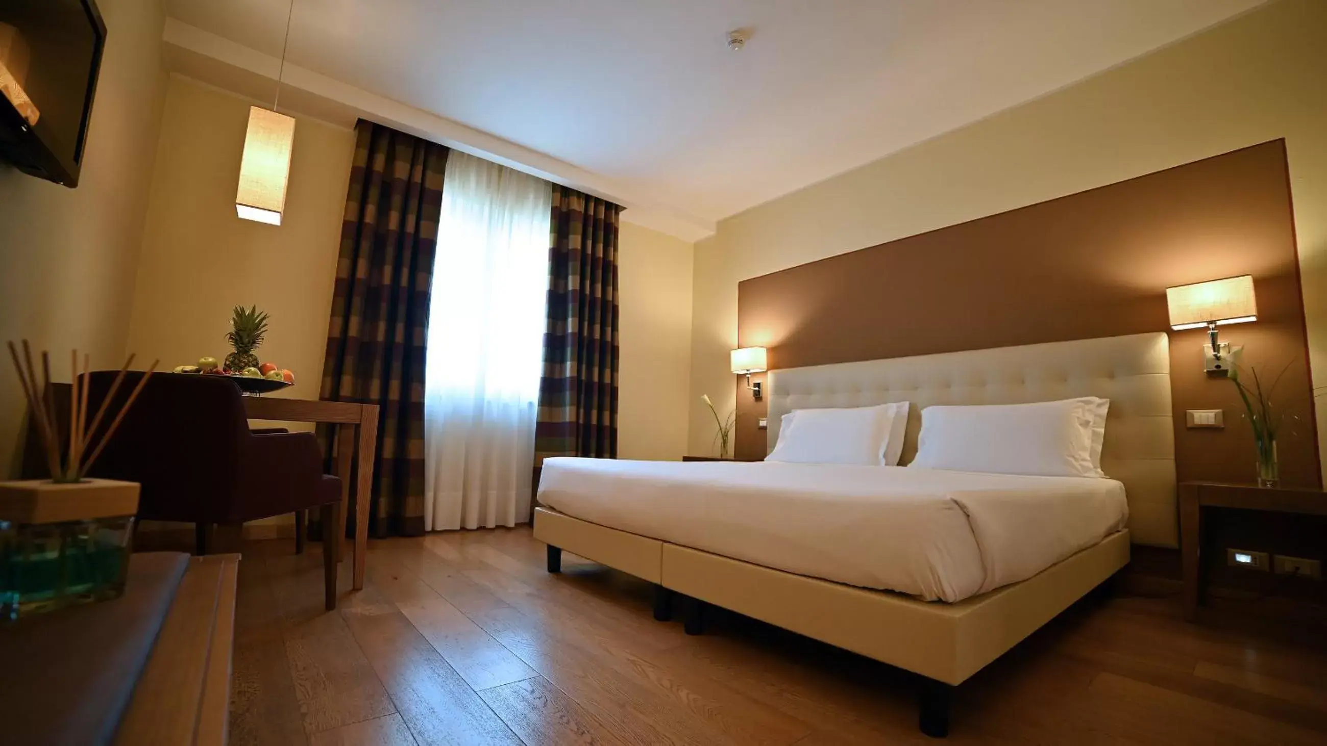 Bed in Best Western Grand Hotel Guinigi