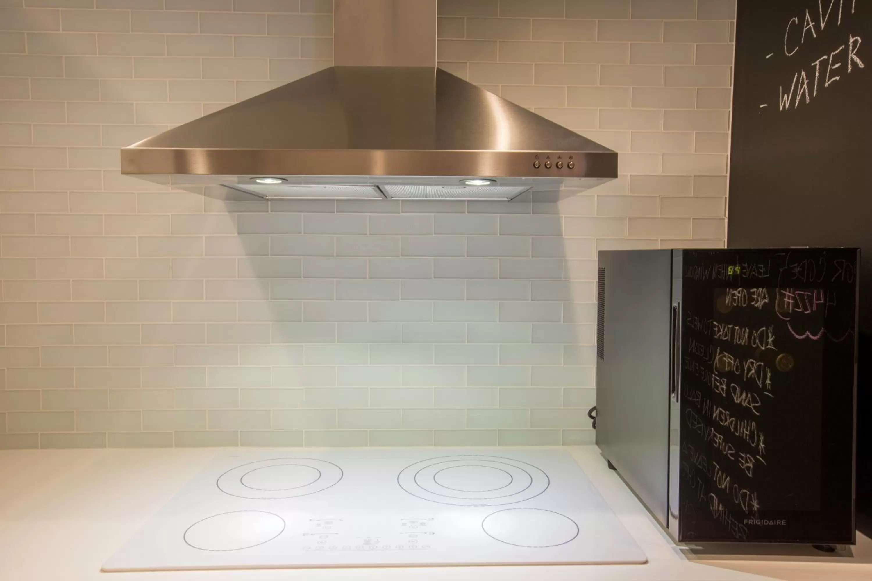 Kitchen or kitchenette in OCEAN VIEW DELUXE SUITE: PVT. BEACH & POOL