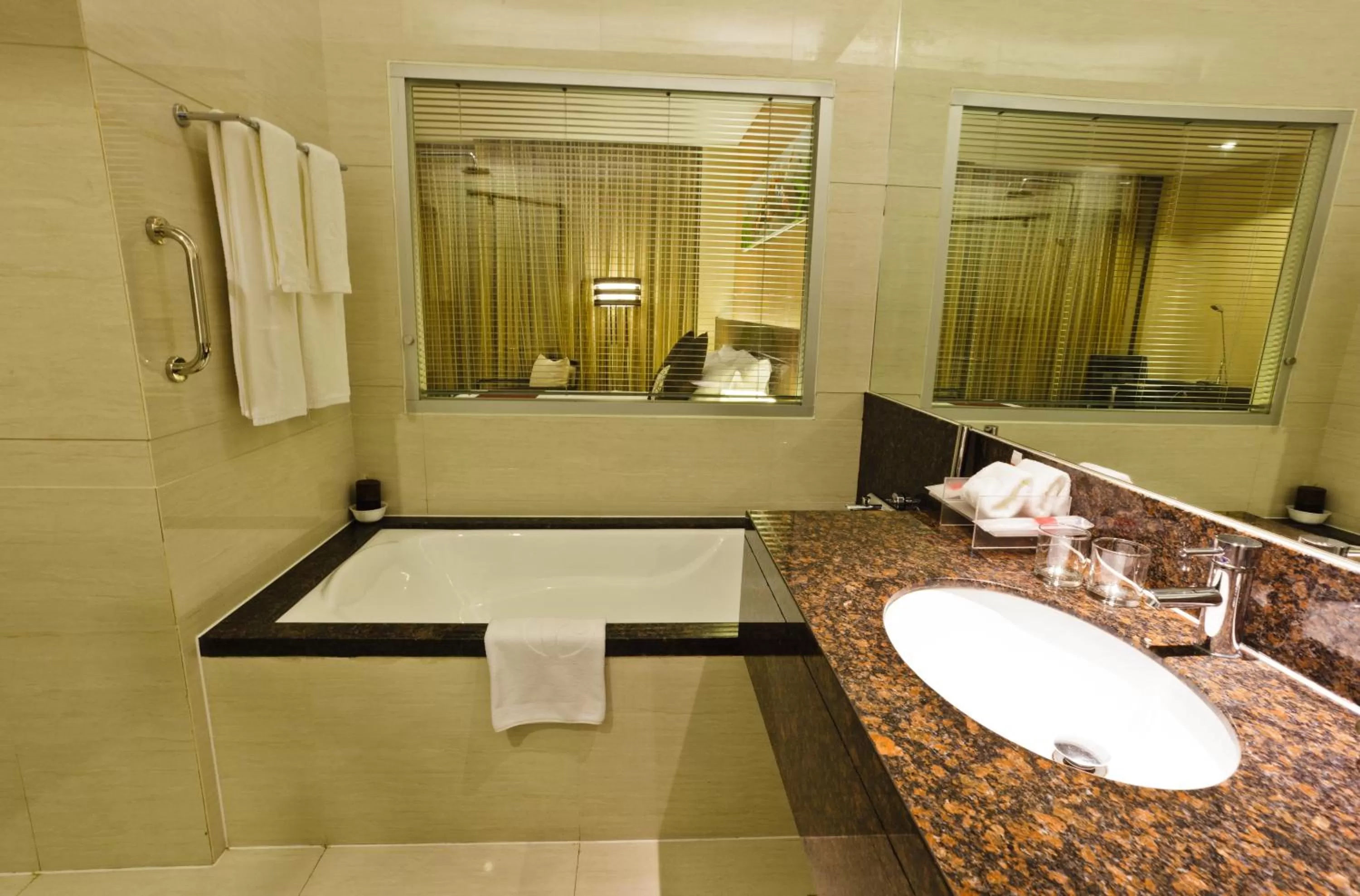 Bathroom in Ramada by Wyndham Manila Central