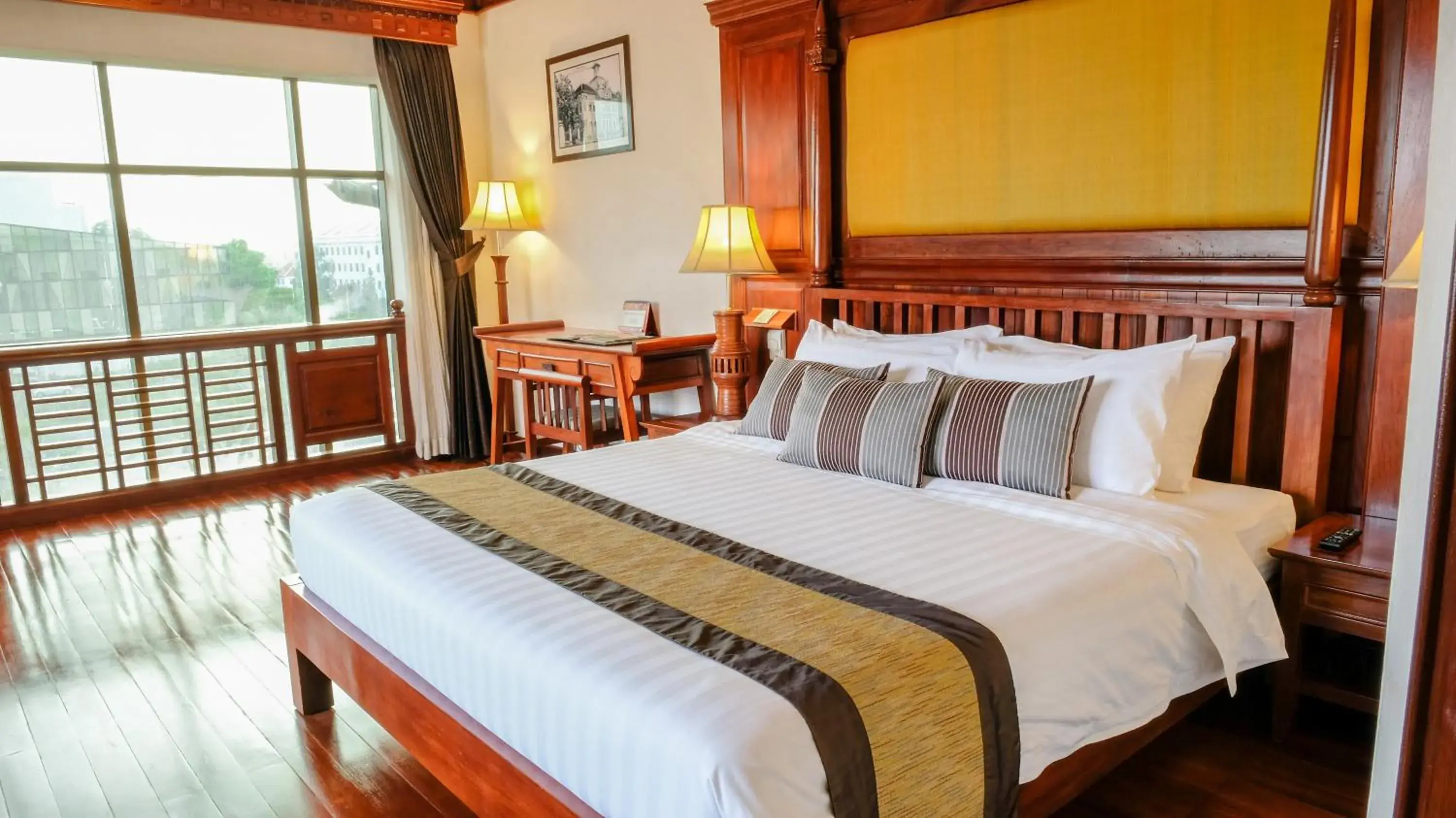 Bed in Empress Angkor Resort & Spa