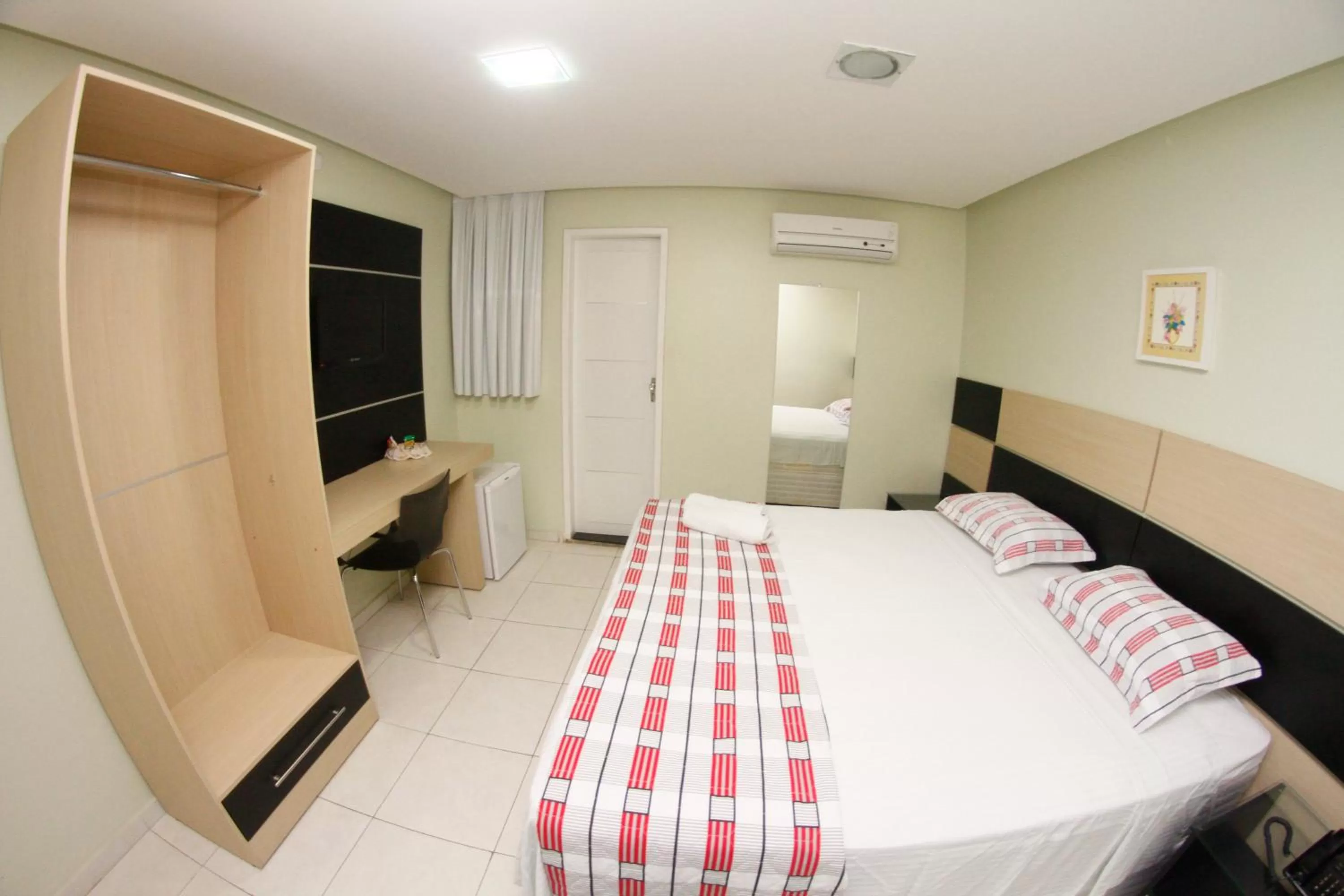 Photo of the whole room, Bed in LW Hotel