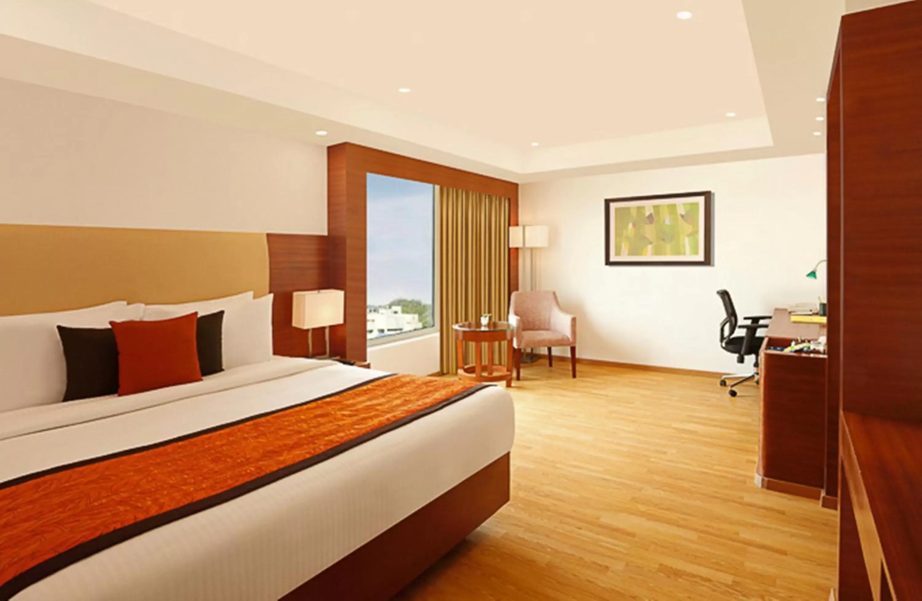 Bedroom in Lemon Tree Hotel Shimona Chennai