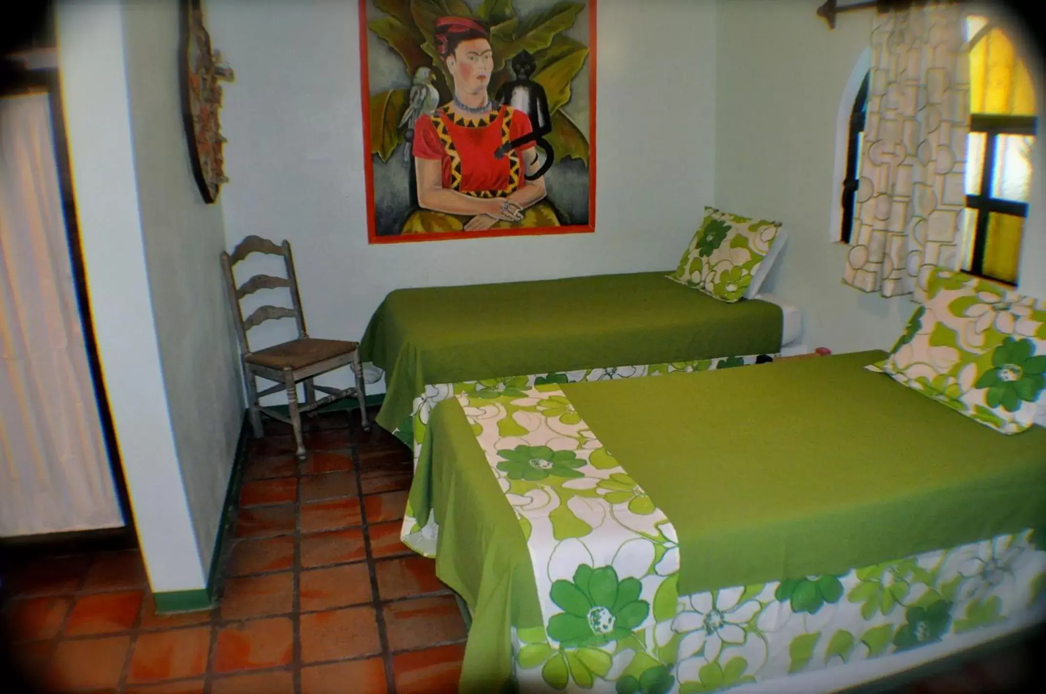 Photo of the whole room, Bed in Cabo Inn