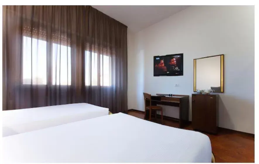 Bed in CDH Hotel Modena Bed in CDH Hotel Modena