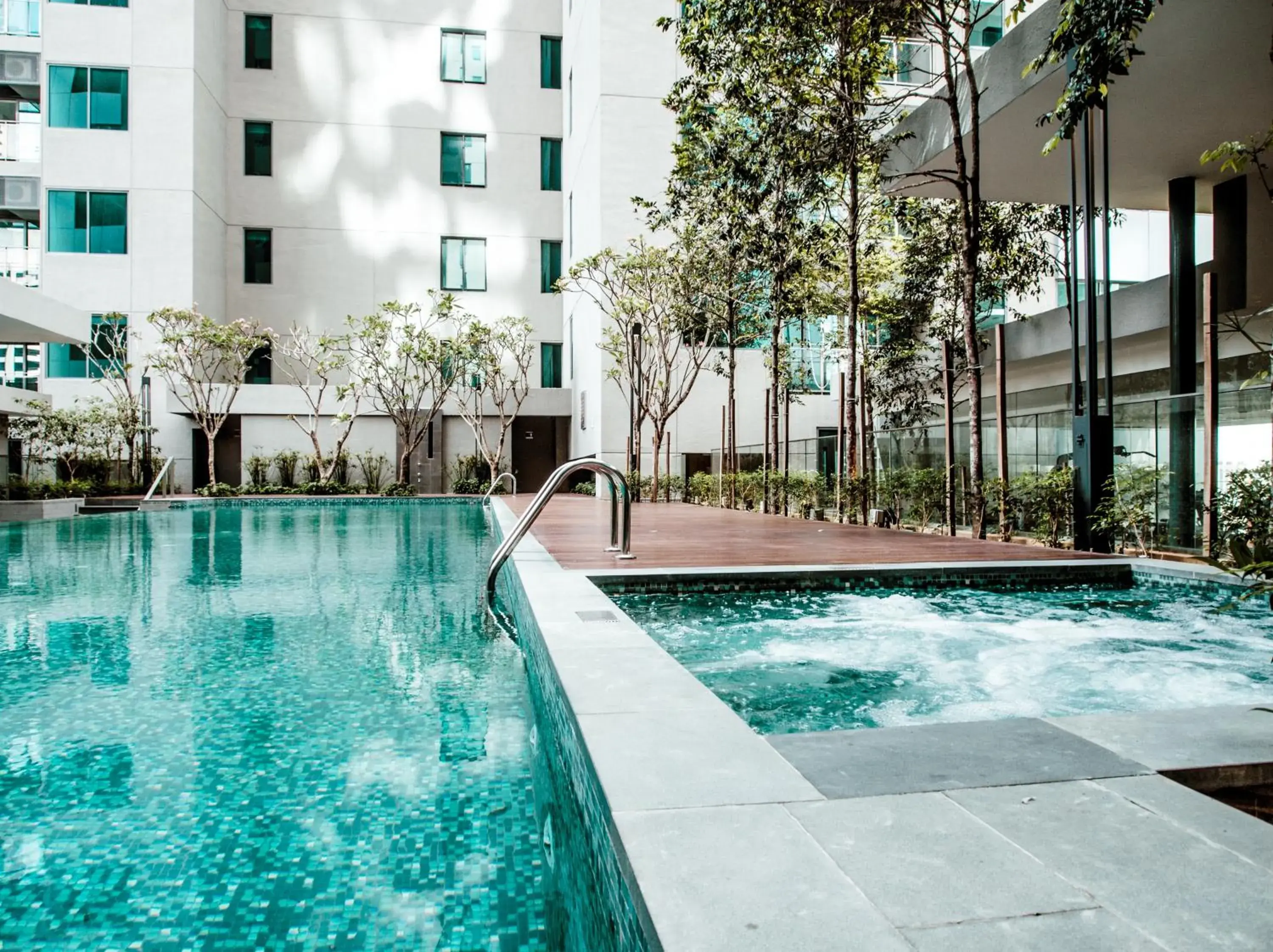 Swimming pool, Property Building in Summer Suites Residences by Subhome