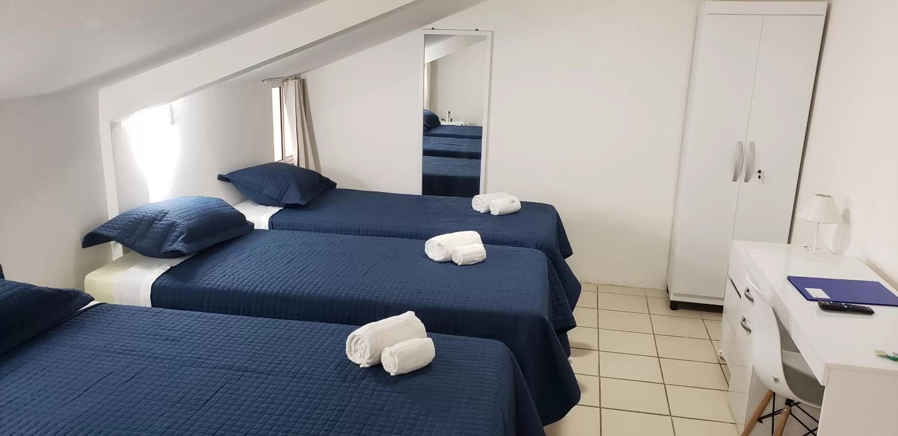 Bed in LIVE IN FORTALEZA HOTEL