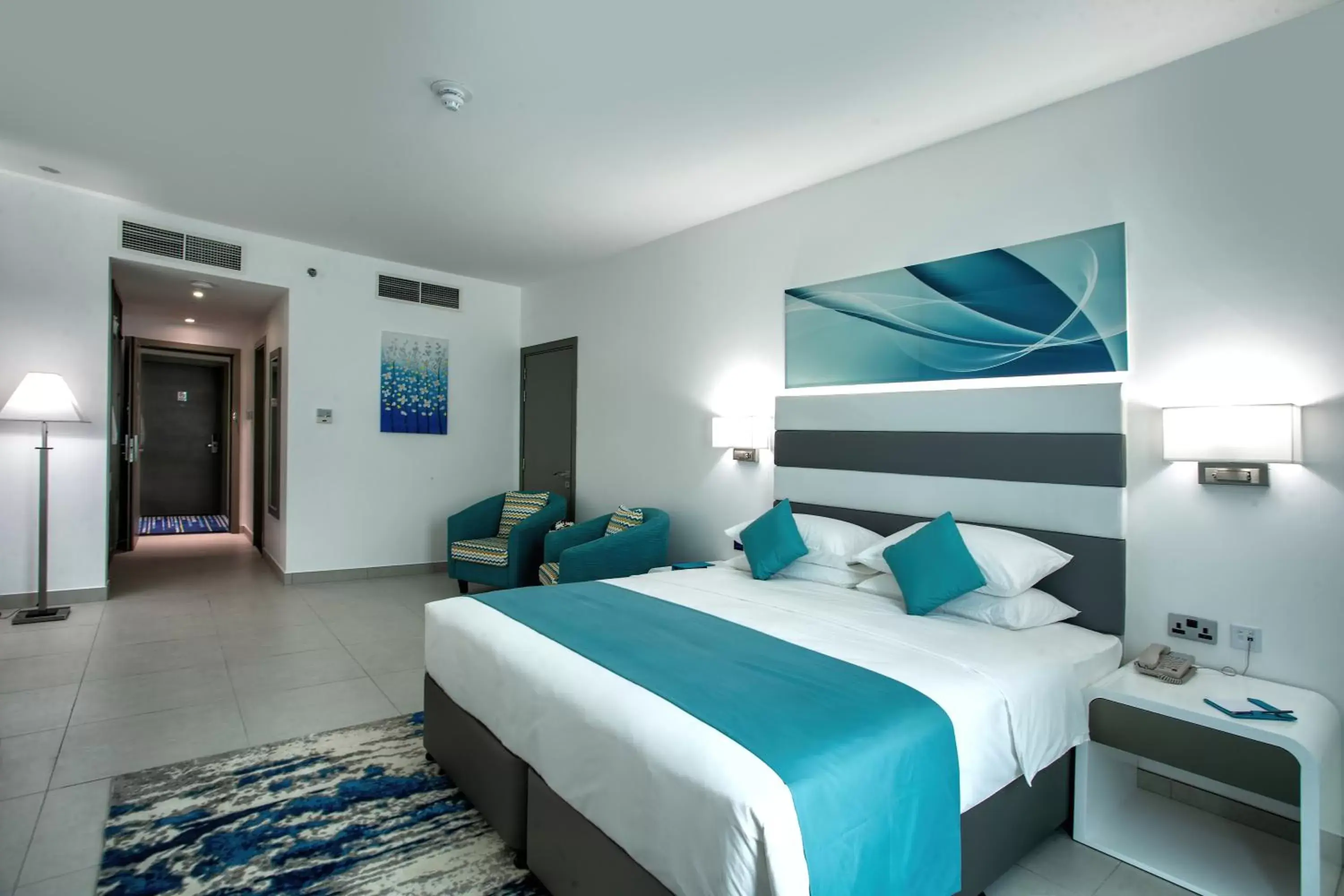 Bedroom in City Avenue Al Reqqa Hotel