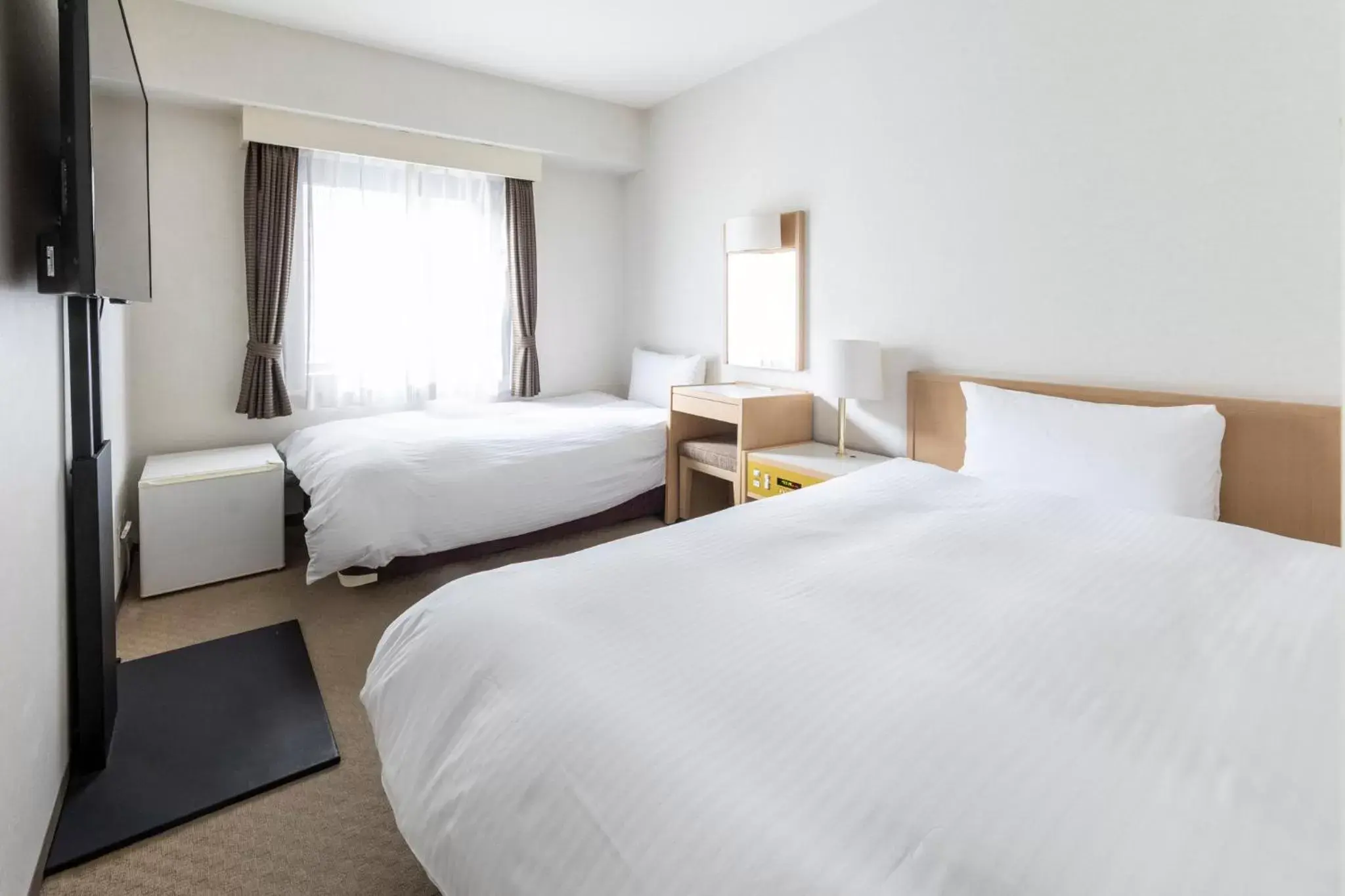 Bed in Court Hotel Niigata