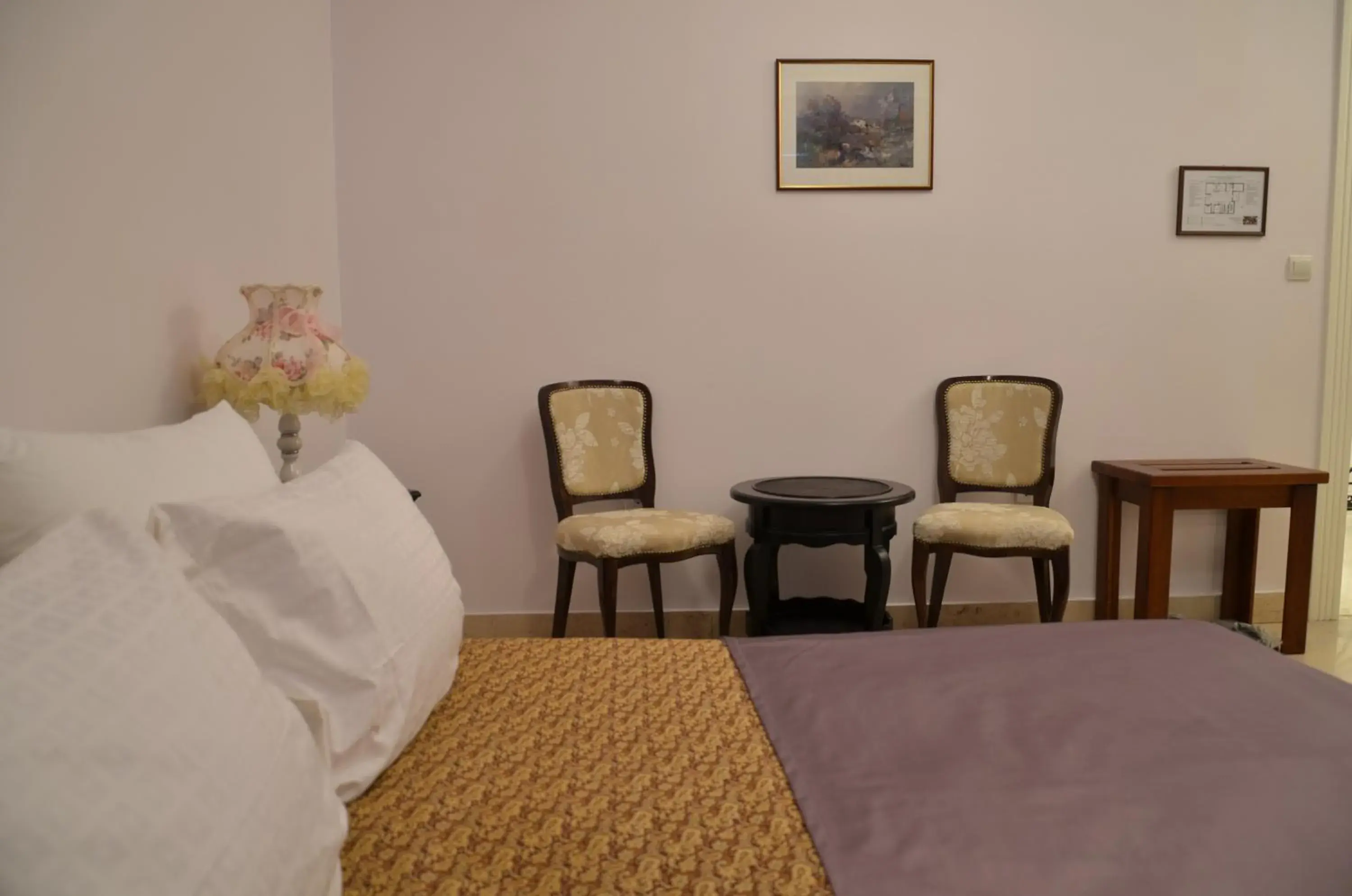 Bed in Garni Hotel Helvetia