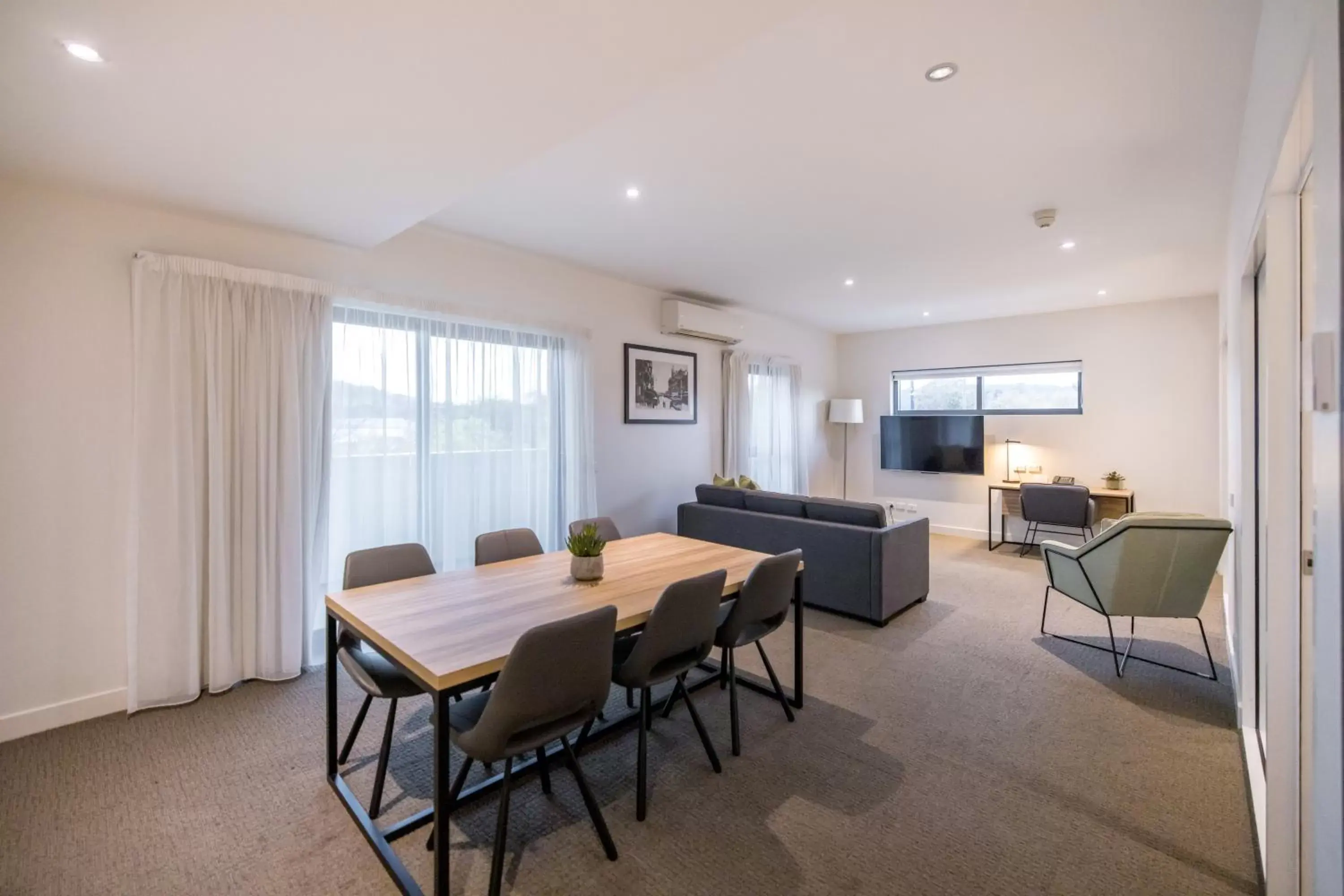 Living room, Dining Area in Quest Wodonga