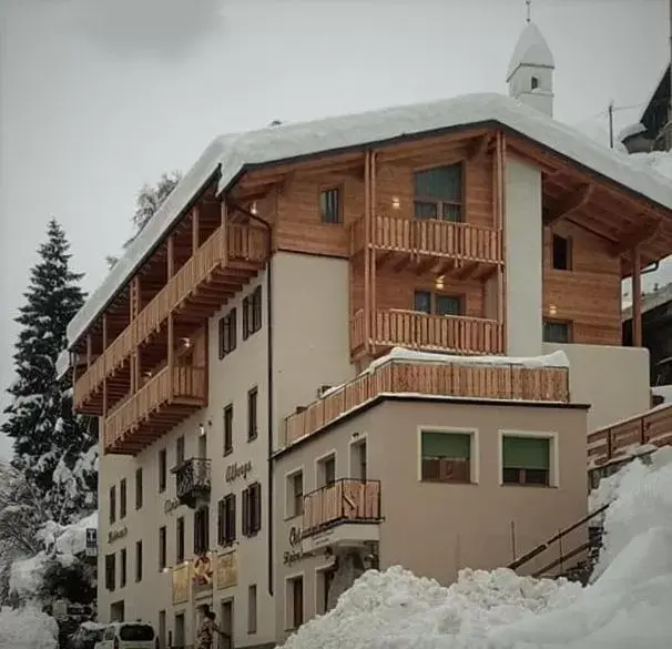 Property building, Winter in Albergo Alpino